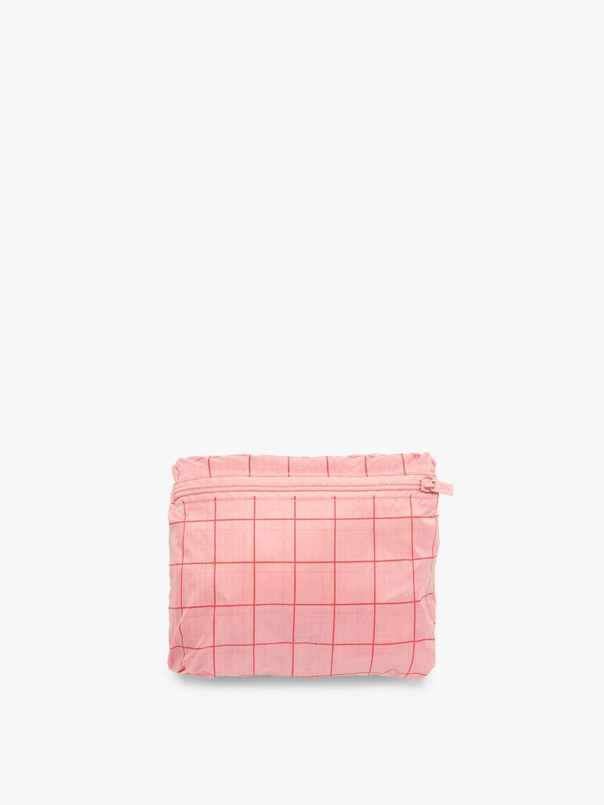 CALPAK Compakt foldable duffle bag for travel in pink grid
