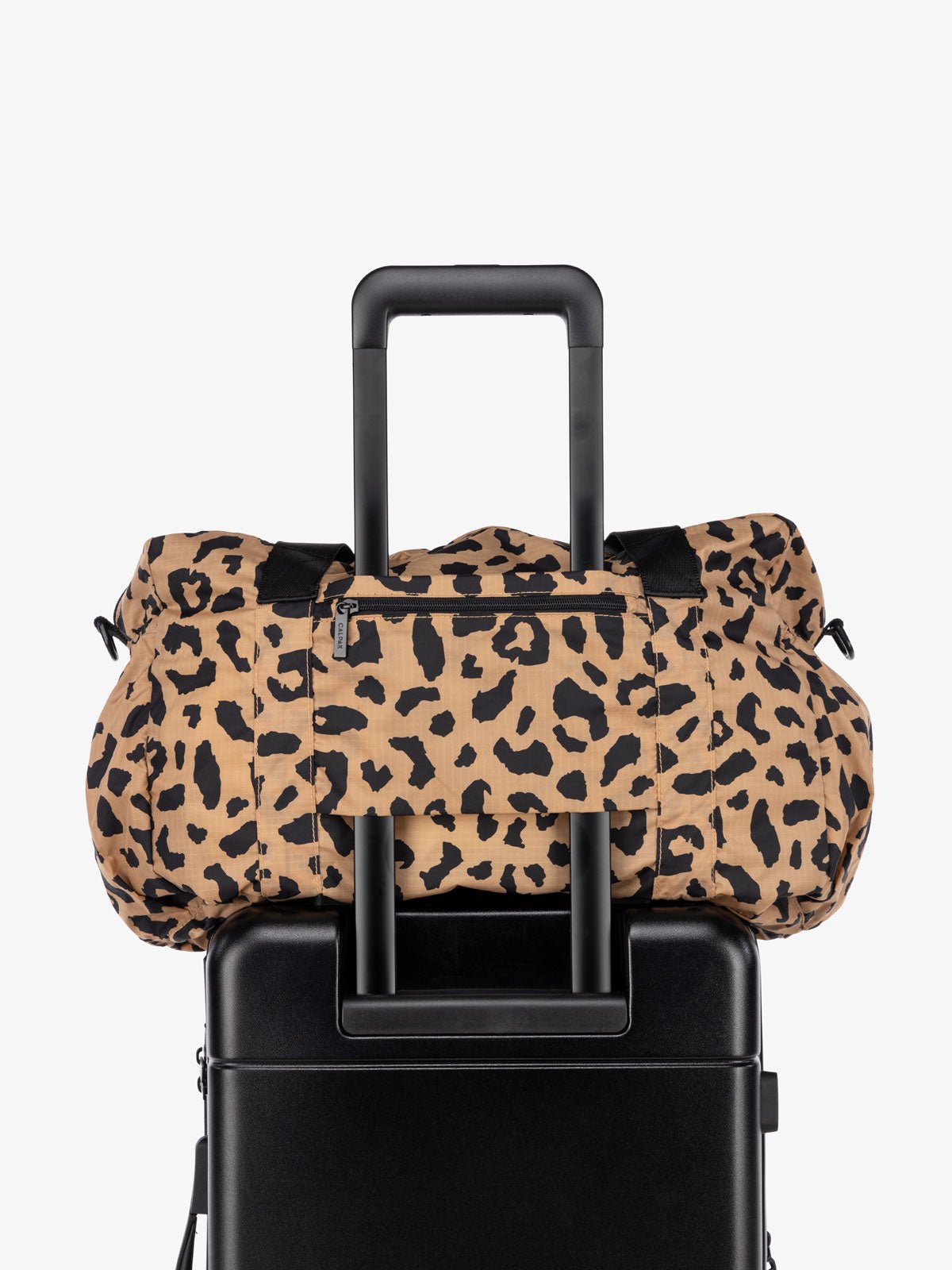 compakt duffel bag part of compakt duo with trolley luggage sleeve in cheetah print