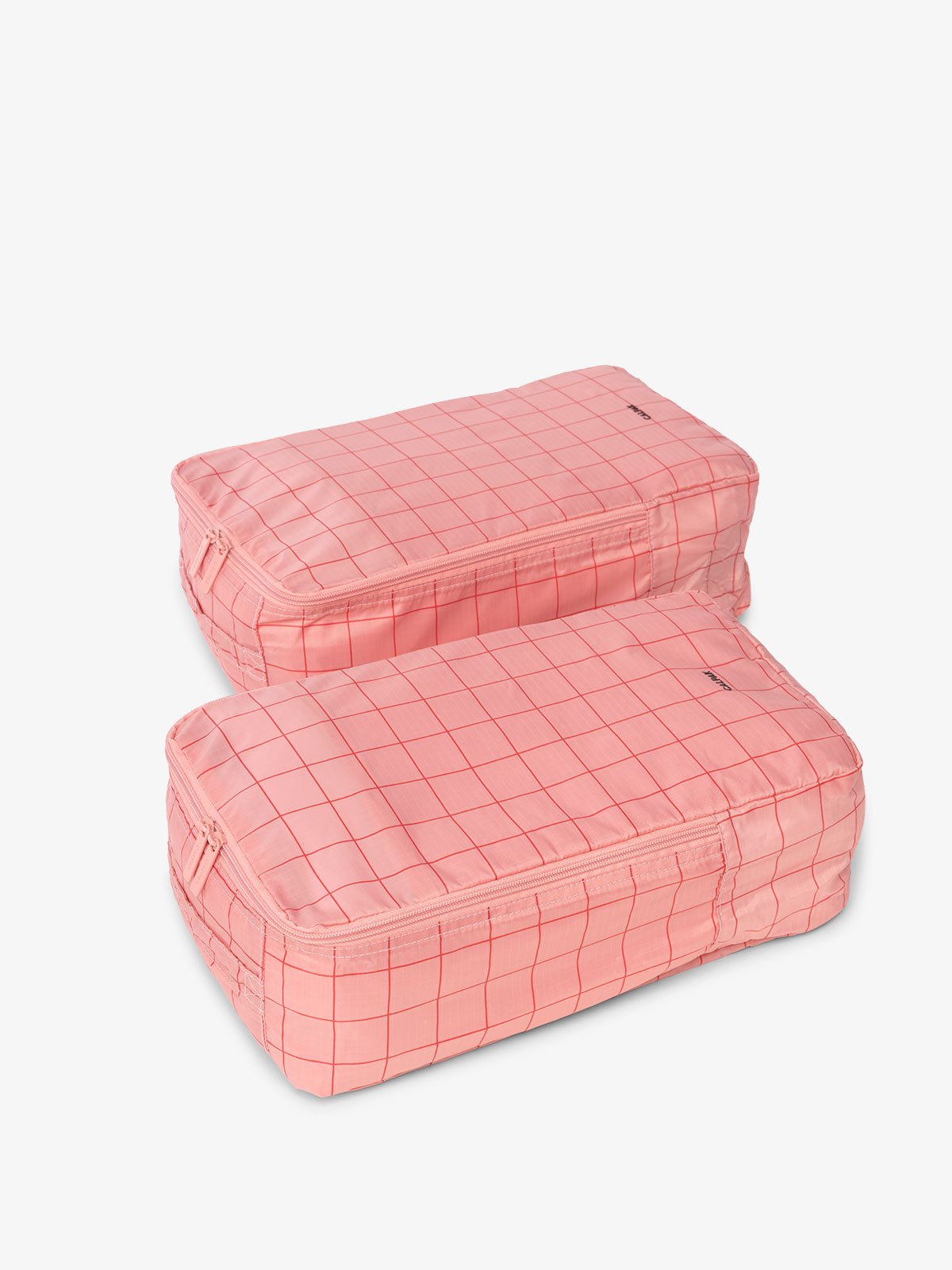 CALPAK Compakt shoe bag set in pink grid