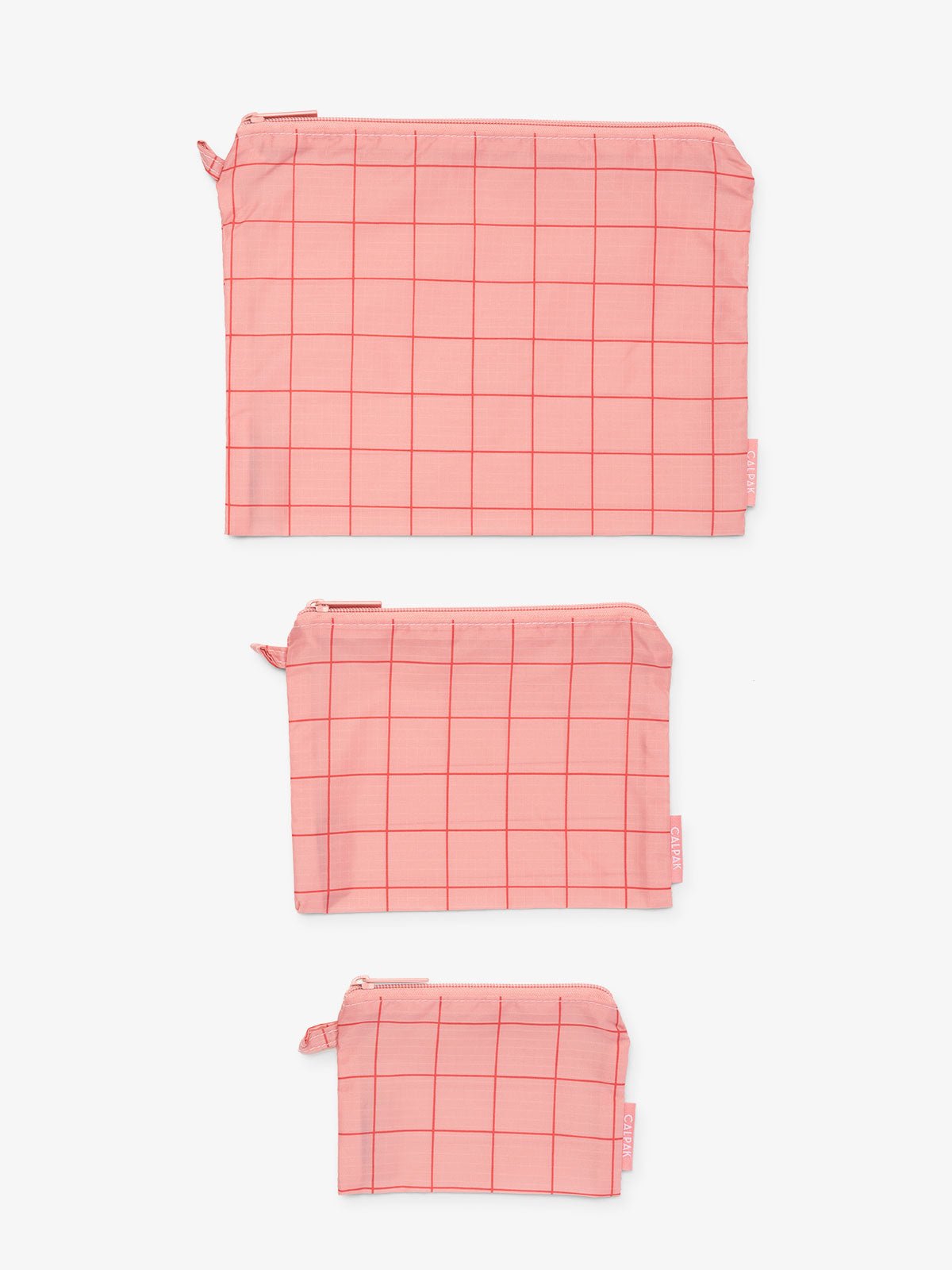CALPAK Compakt water resistant zippered pouch set for organization in pink grid