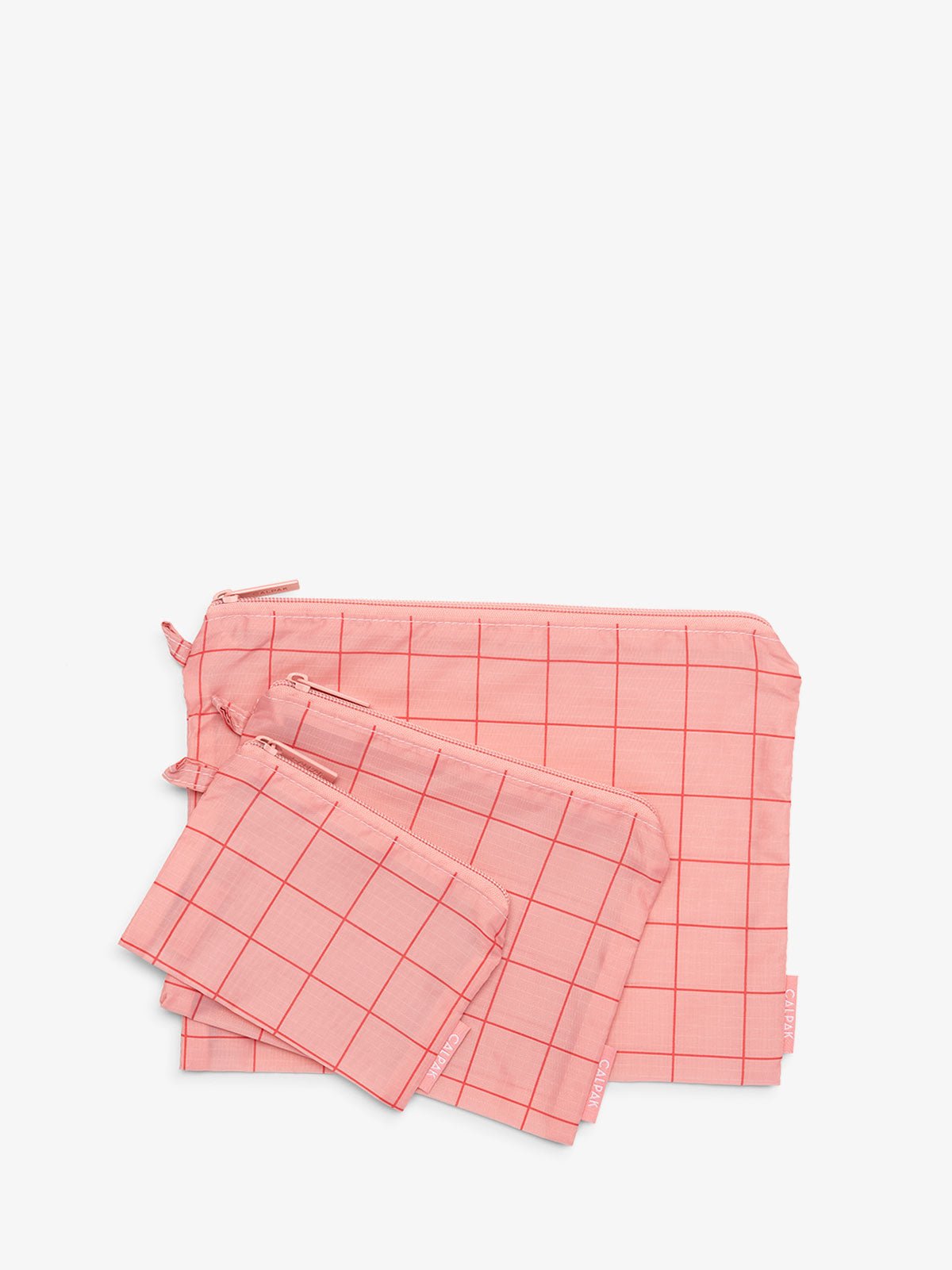 CALPAK Compakt zippered pouches in pink grid