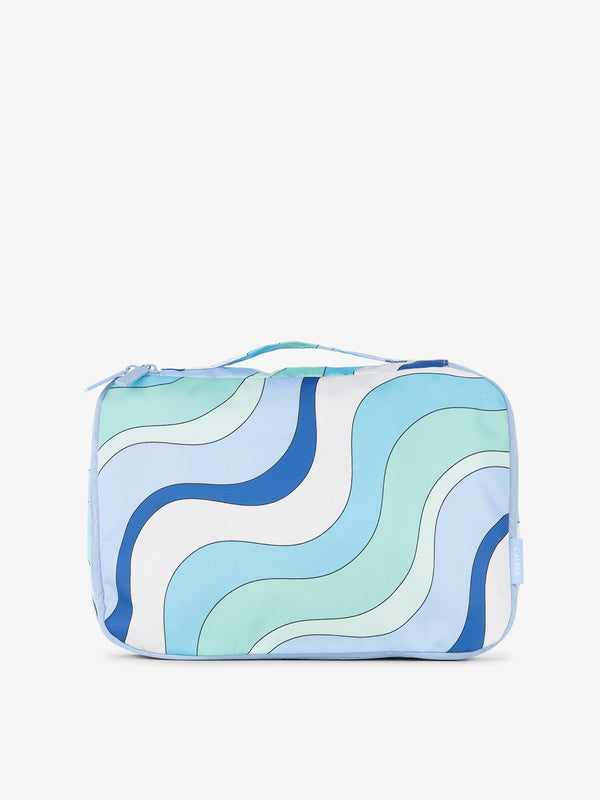CALPAK packing cubes with top handle in wavy blue print