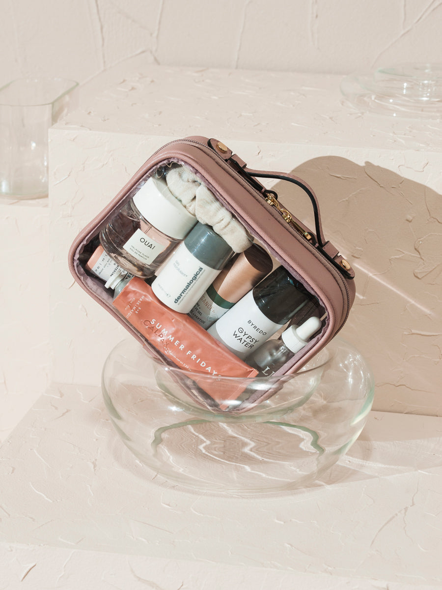 CALPAK  transparent cosmetics case with handles in pink