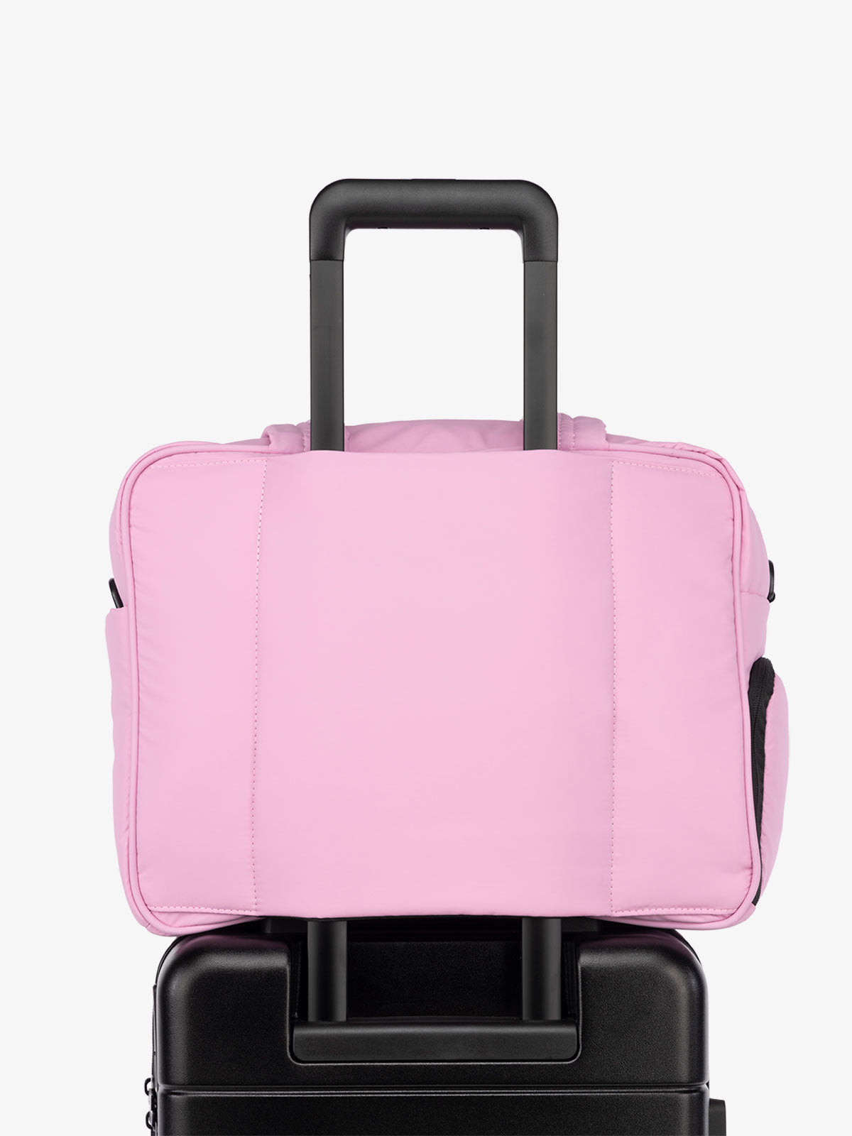 CALPAK Luka Weekender Duffel Bag with trolley sleeve for travel in pink