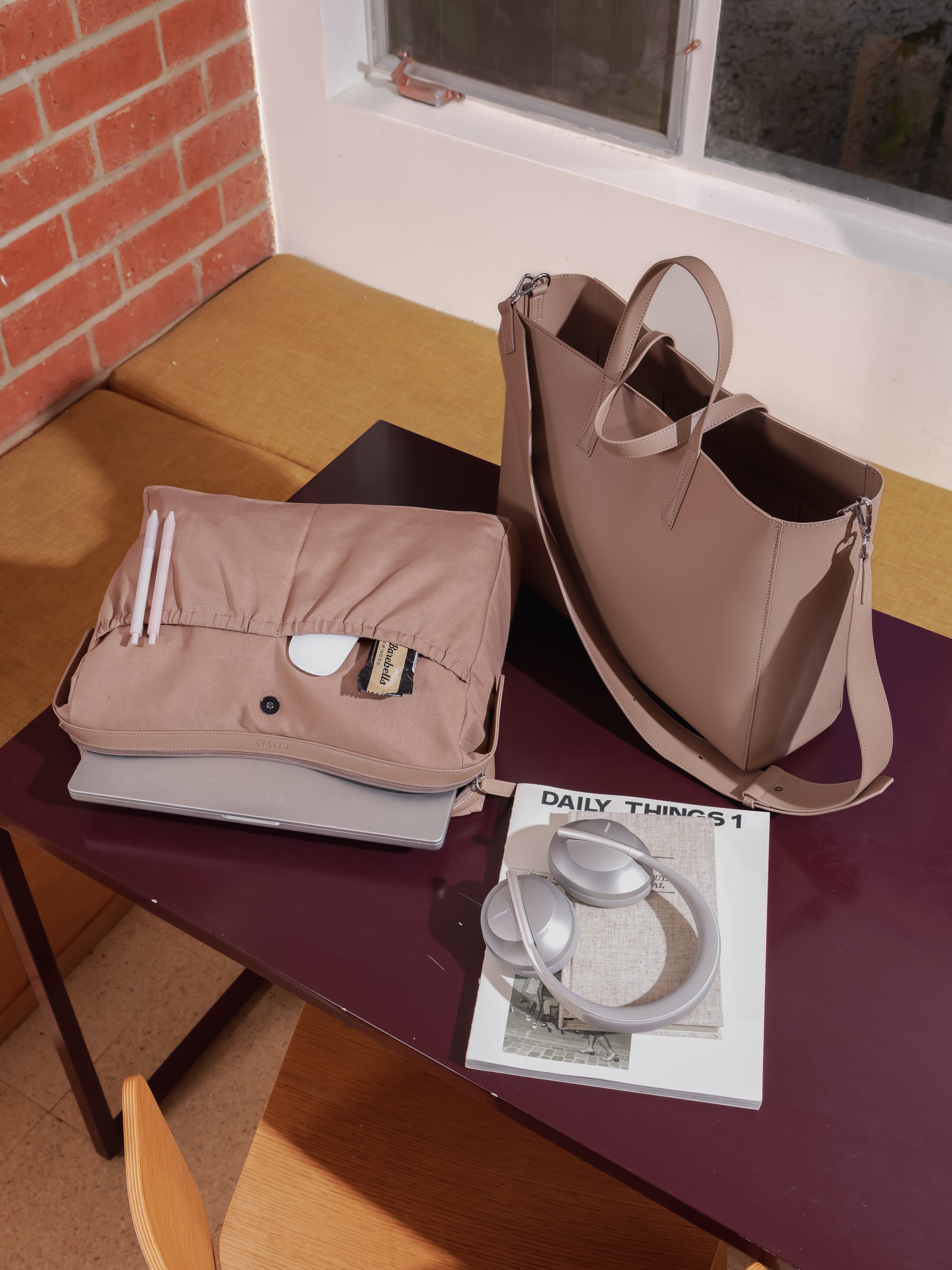 CALPAK Haven laptop tote bag with removeable laptop sleeve and crossbody strap in taupe brown