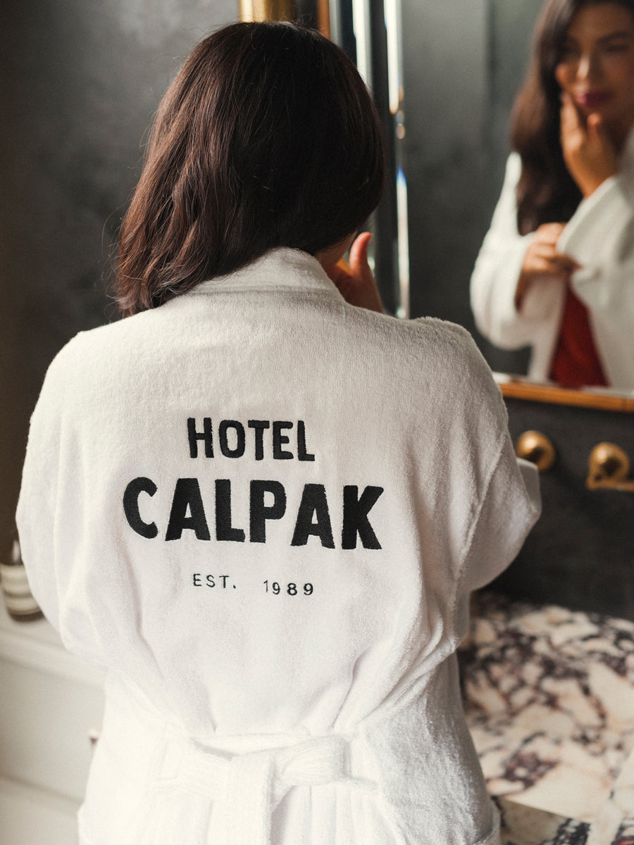 Hotel CALPAK white cotton bathrobe modeled