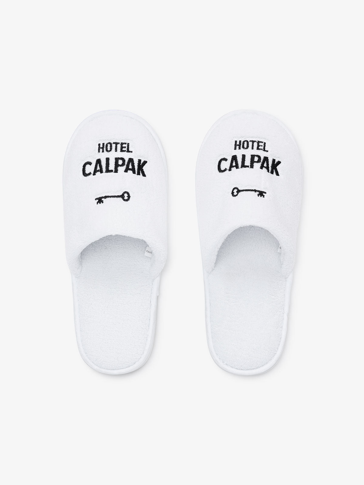 Hotel CALPAK white plush slippers