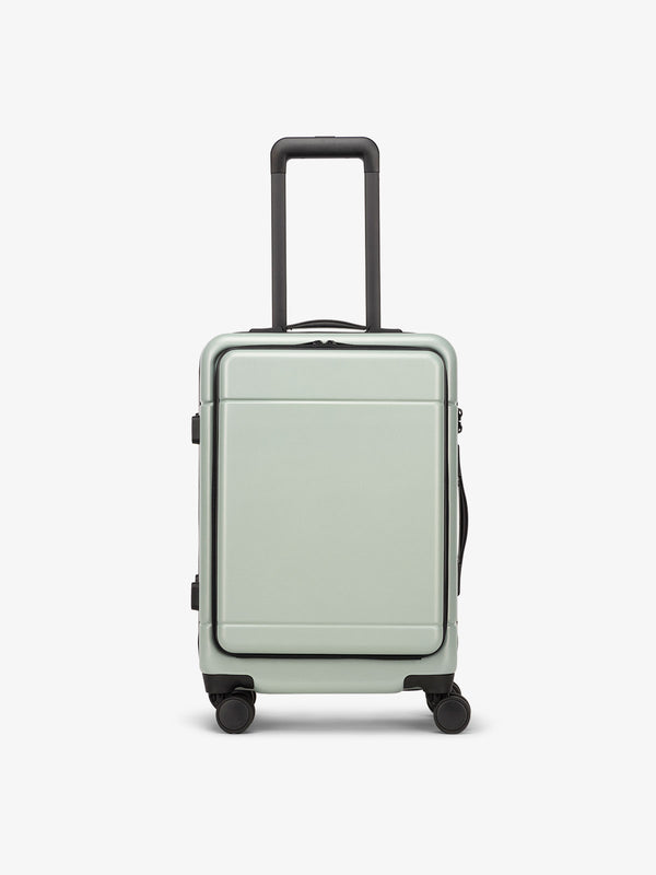 CALPAK Hue carry on luggage with hard shell pocket in light green jade
