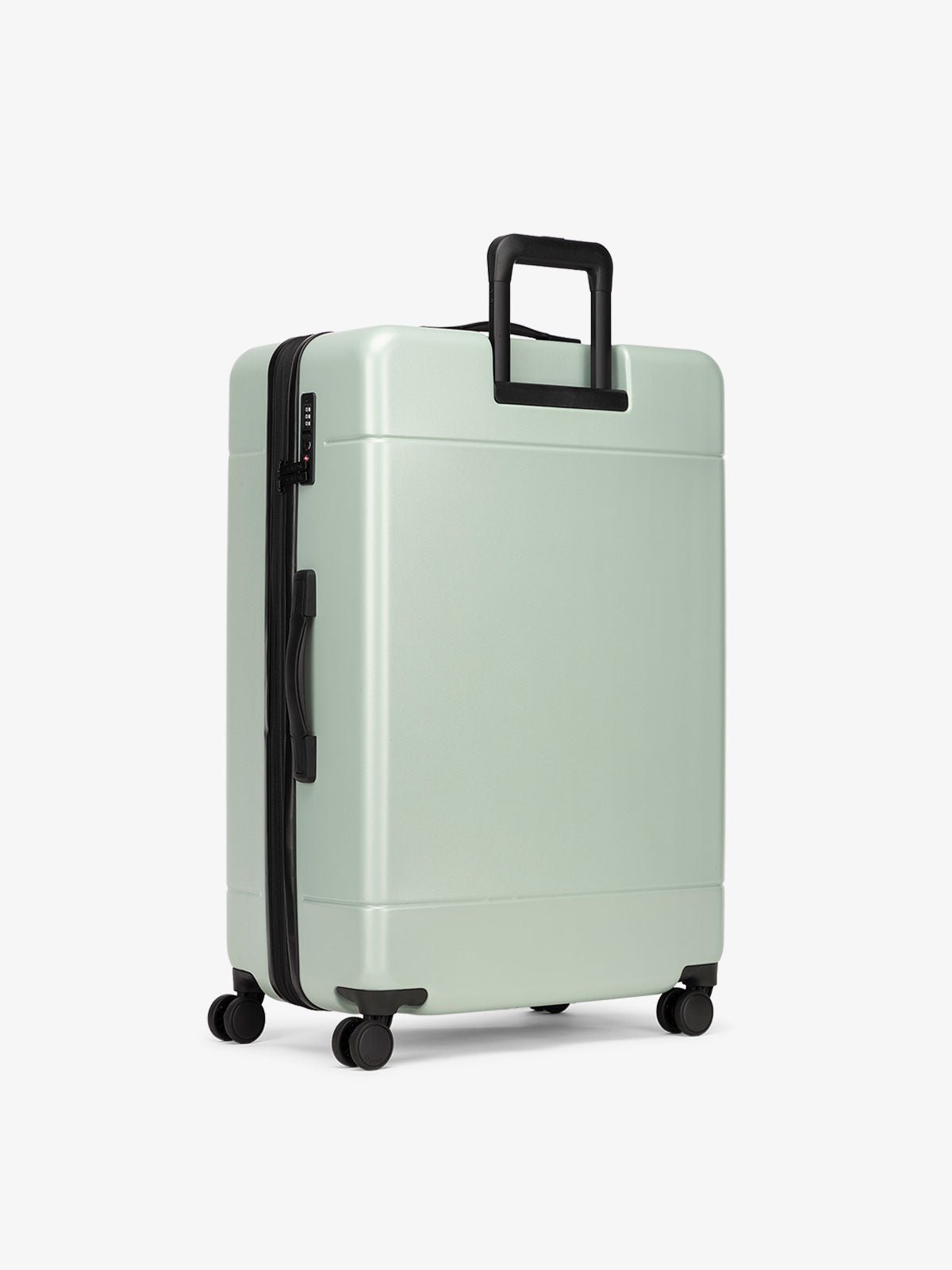 Hue large 28 inch durable hard shell polycarbonate luggage in light green jade
