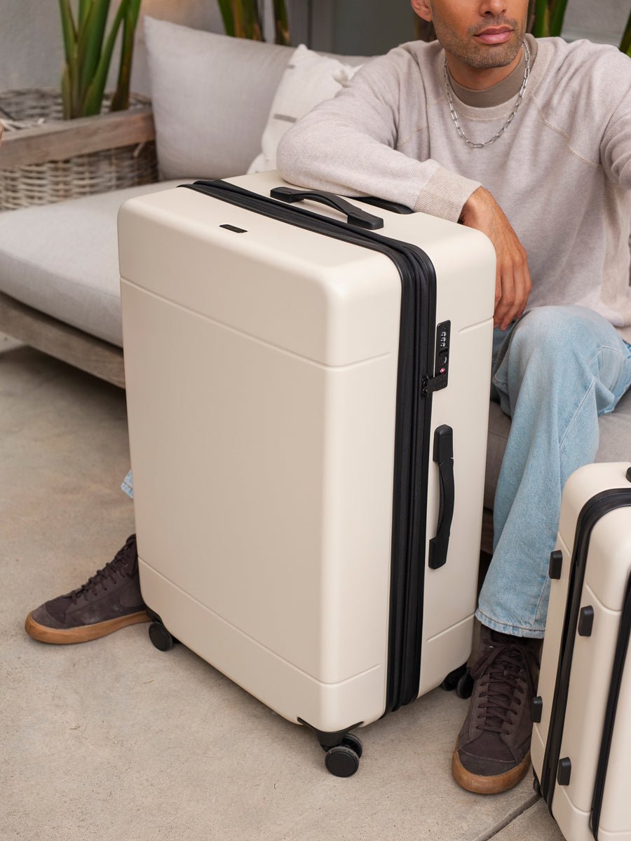 CALPAK Hue large 30 inch durable polycarbonate luggage