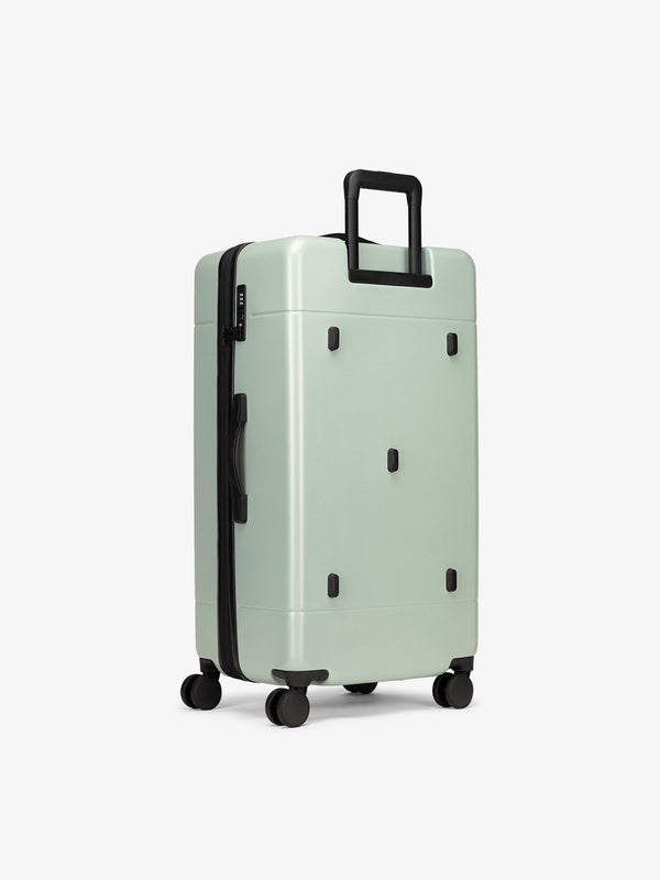 Hue 30 inch hard shell trunk luggage with 360 spinner wheels