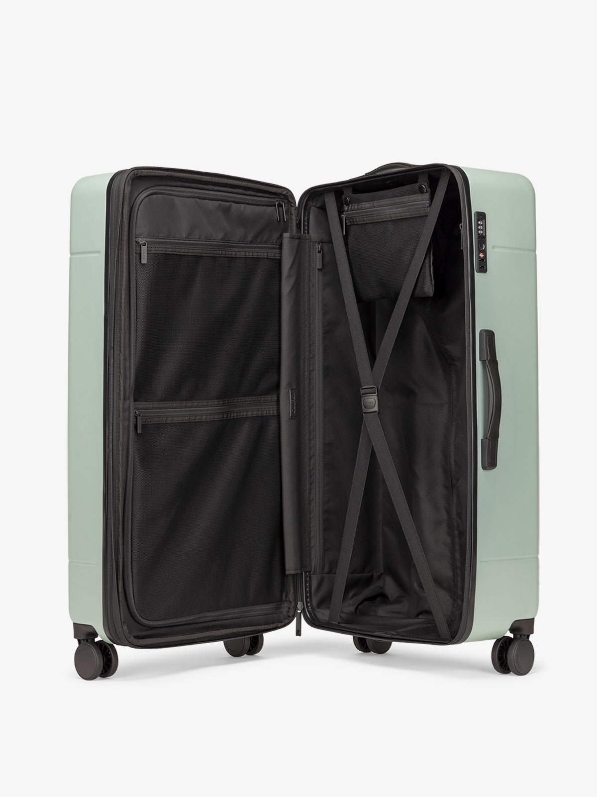 Hue trunk suitcase in light green jade with compression straps