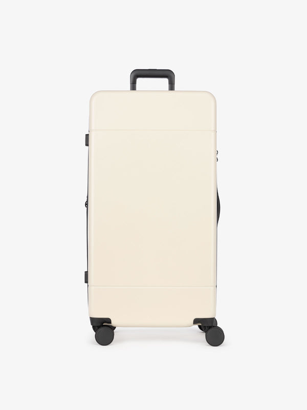 CALPAK Hue 31 inch hard side polycarbonate trunk luggage in cream linen