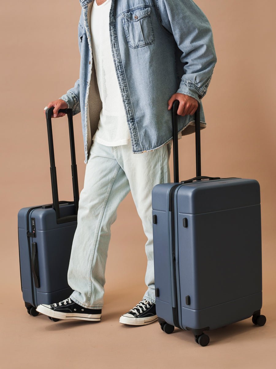 medium 26 inch hardshell stylish minimalist CALPAK Hue suitcase in blue atlantic