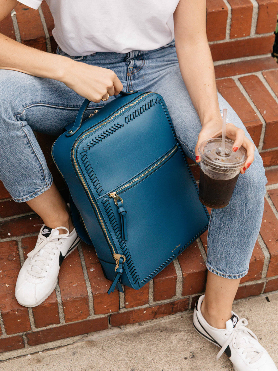CALPAK Kaya Laptop everyday backpack with top handle adjustable straps and front pocket in dark blue