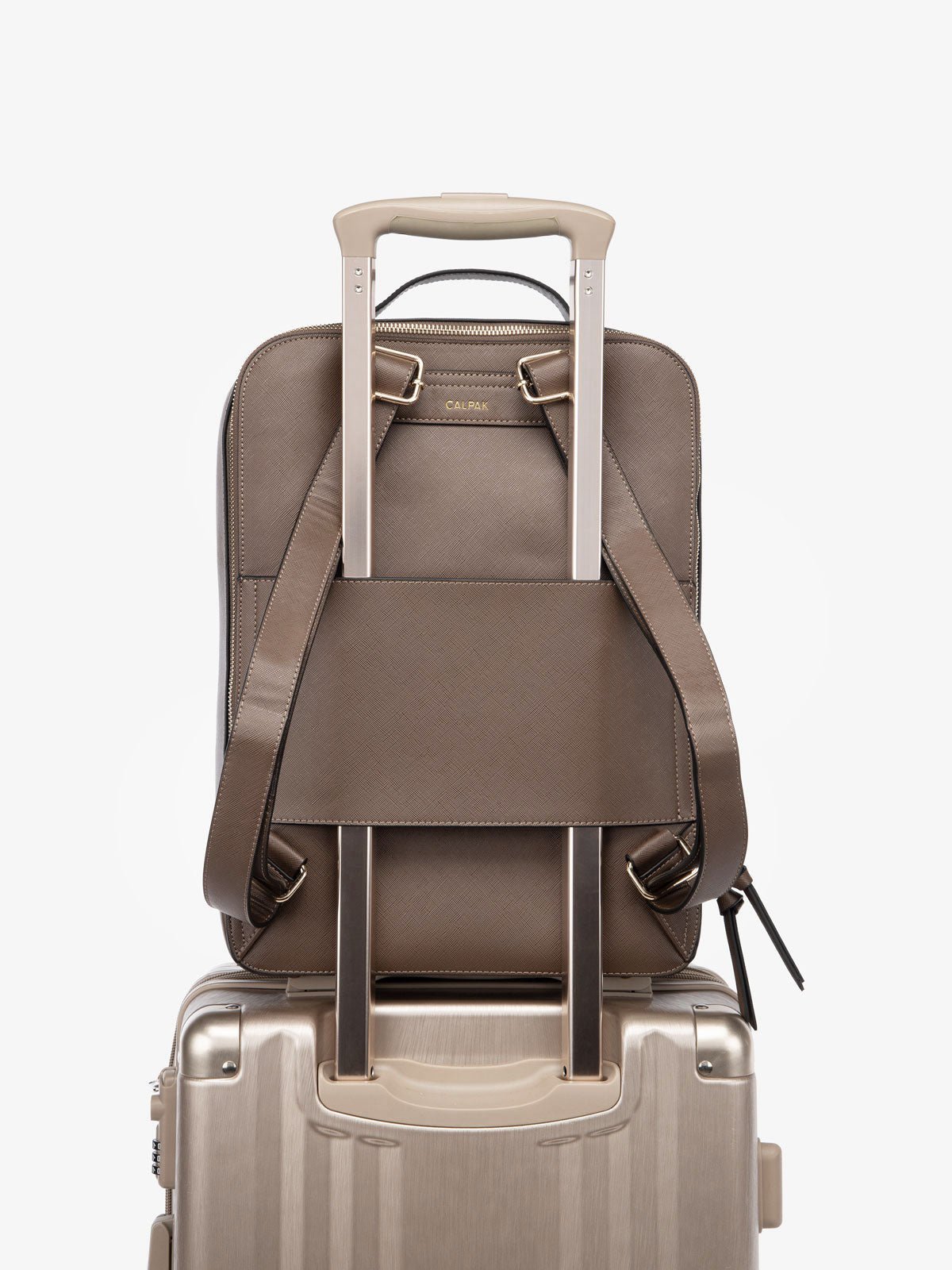 brown CALPAK Kaya Laptop Backpack with trolley sleeve for travel