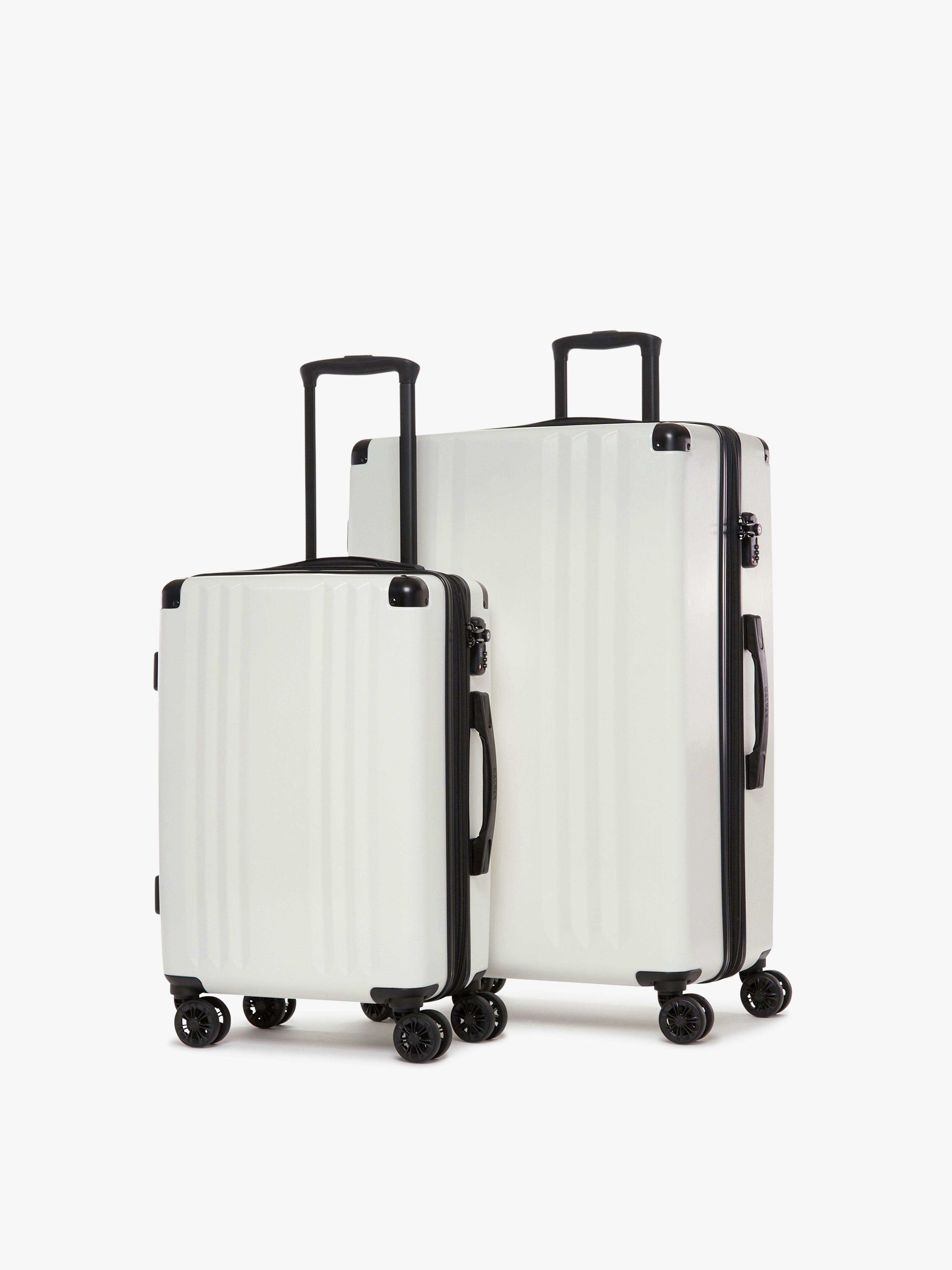 CALPAK Ambeur: 2 piece lightweight expandable white hard shell luggage set with carry on