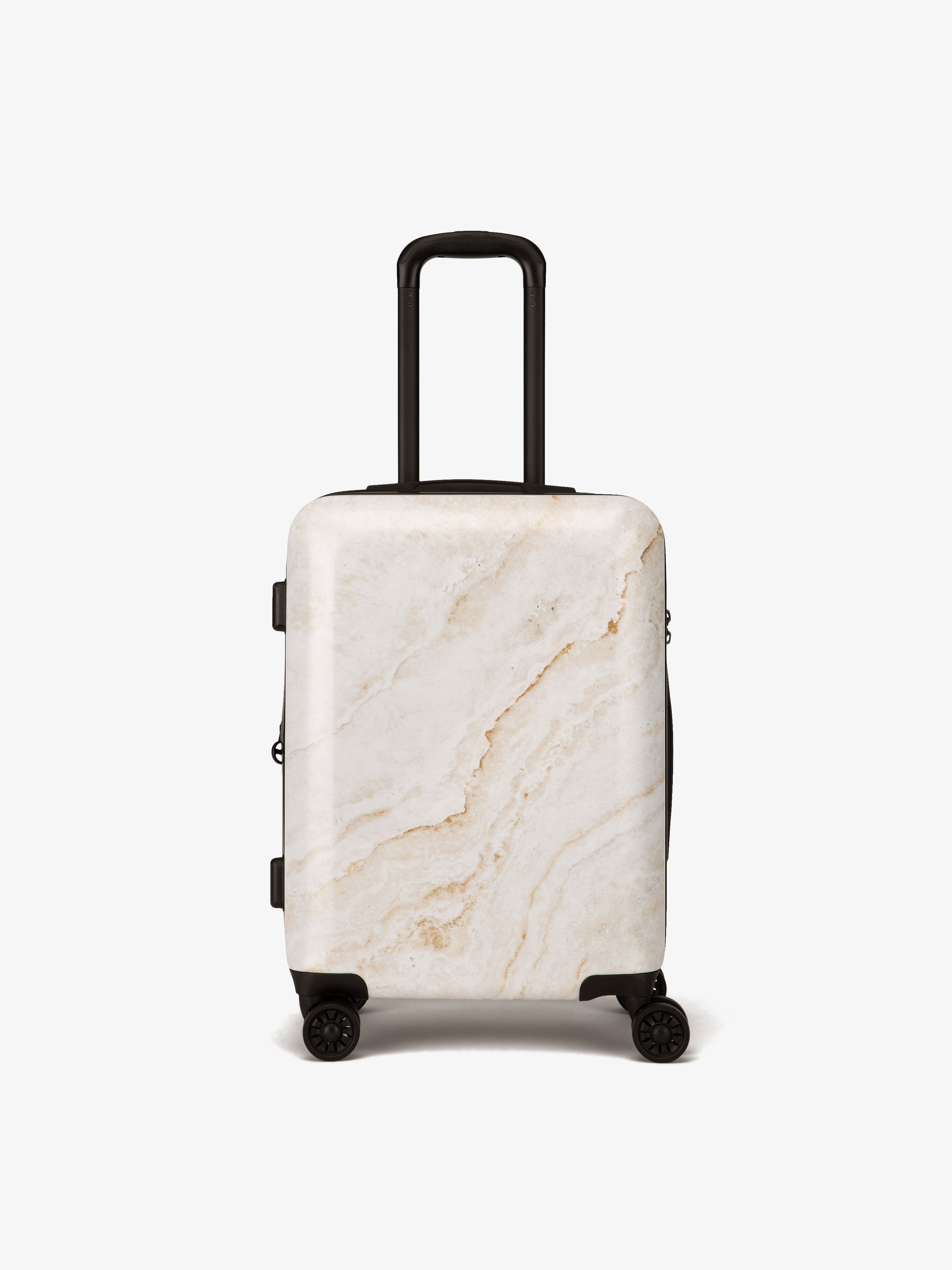 CALPAK gold marble hard shell carry-on luggage