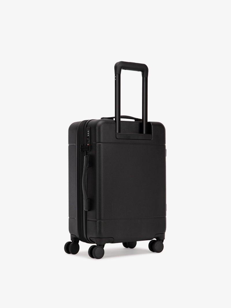 CALPAK Hue hard side carry-on luggage with spinner wheels in black
