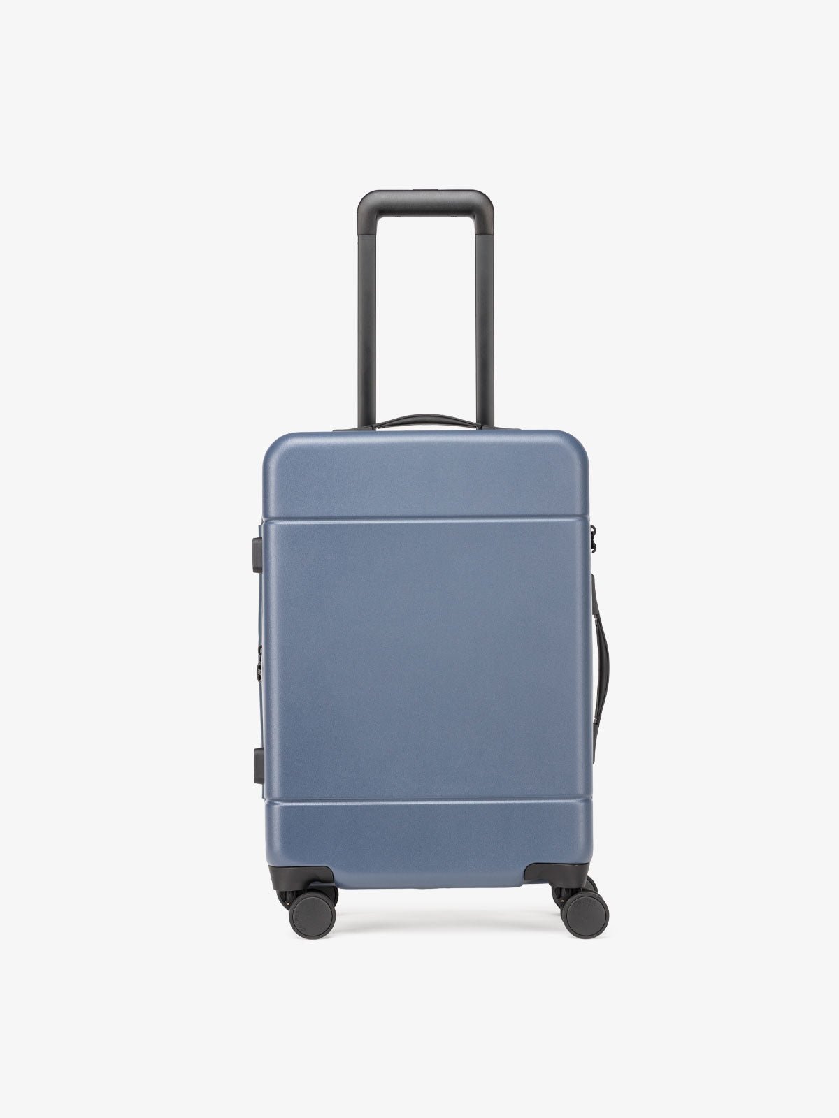 CALPAK Hue hard shell rolling carry-on luggage in blue atlantic color