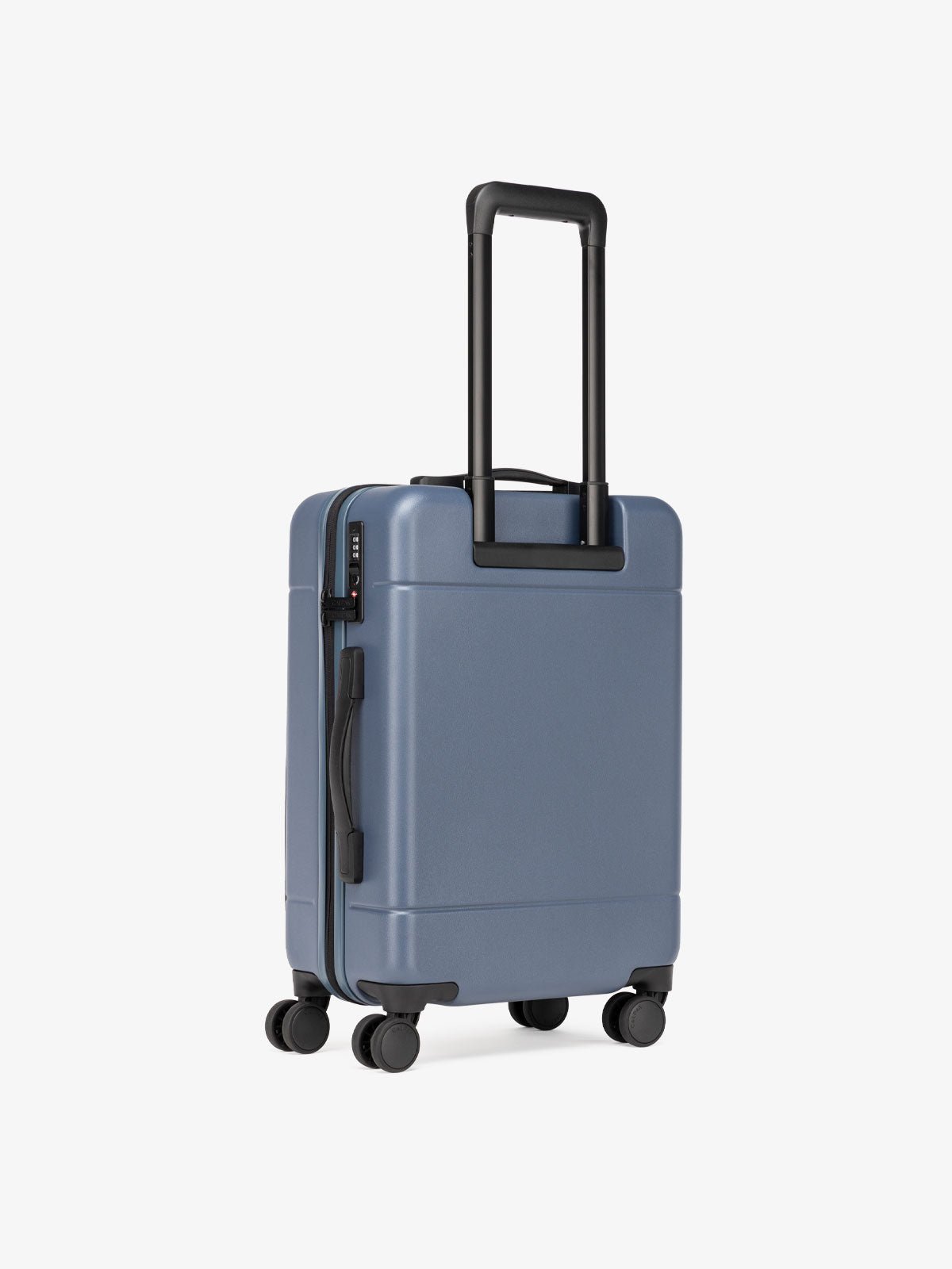 CALPAK Hue hard side carry-on luggage with spinner wheels in blue atlantic