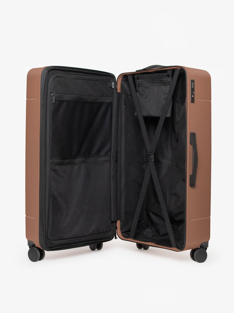 CALPAK Hue trunk suitcase in brown hazel color with compression straps