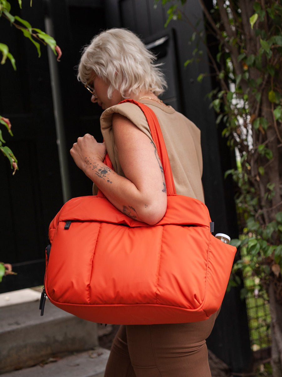 Luka weekender travel duffel bag in red orange