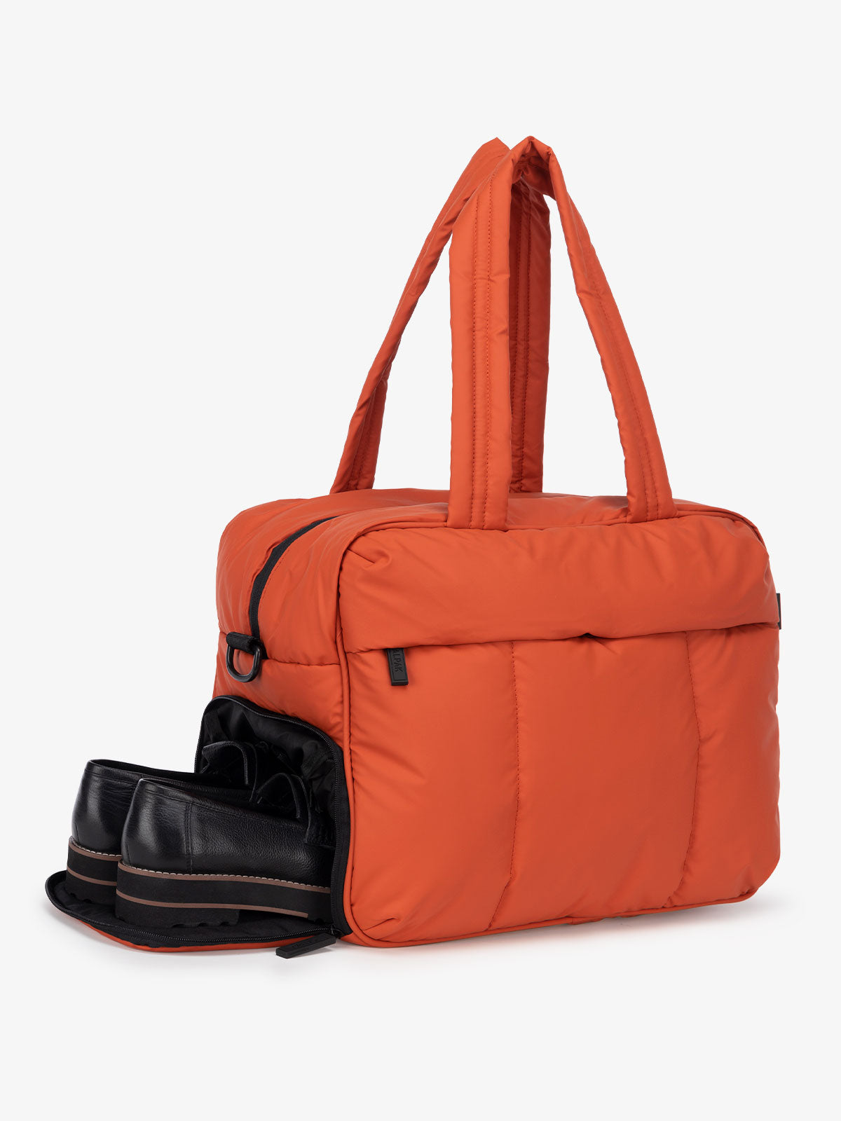 red orange duffle bag for travel with shoe compartment