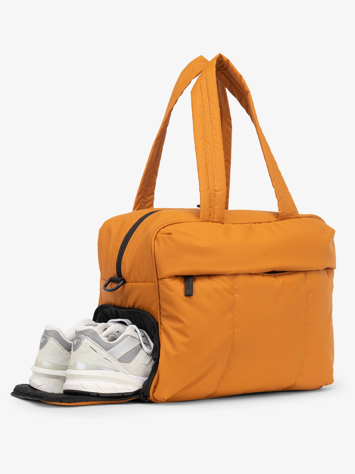 CALPAK Luka Duffel Bag shoe compartment in pumpkin