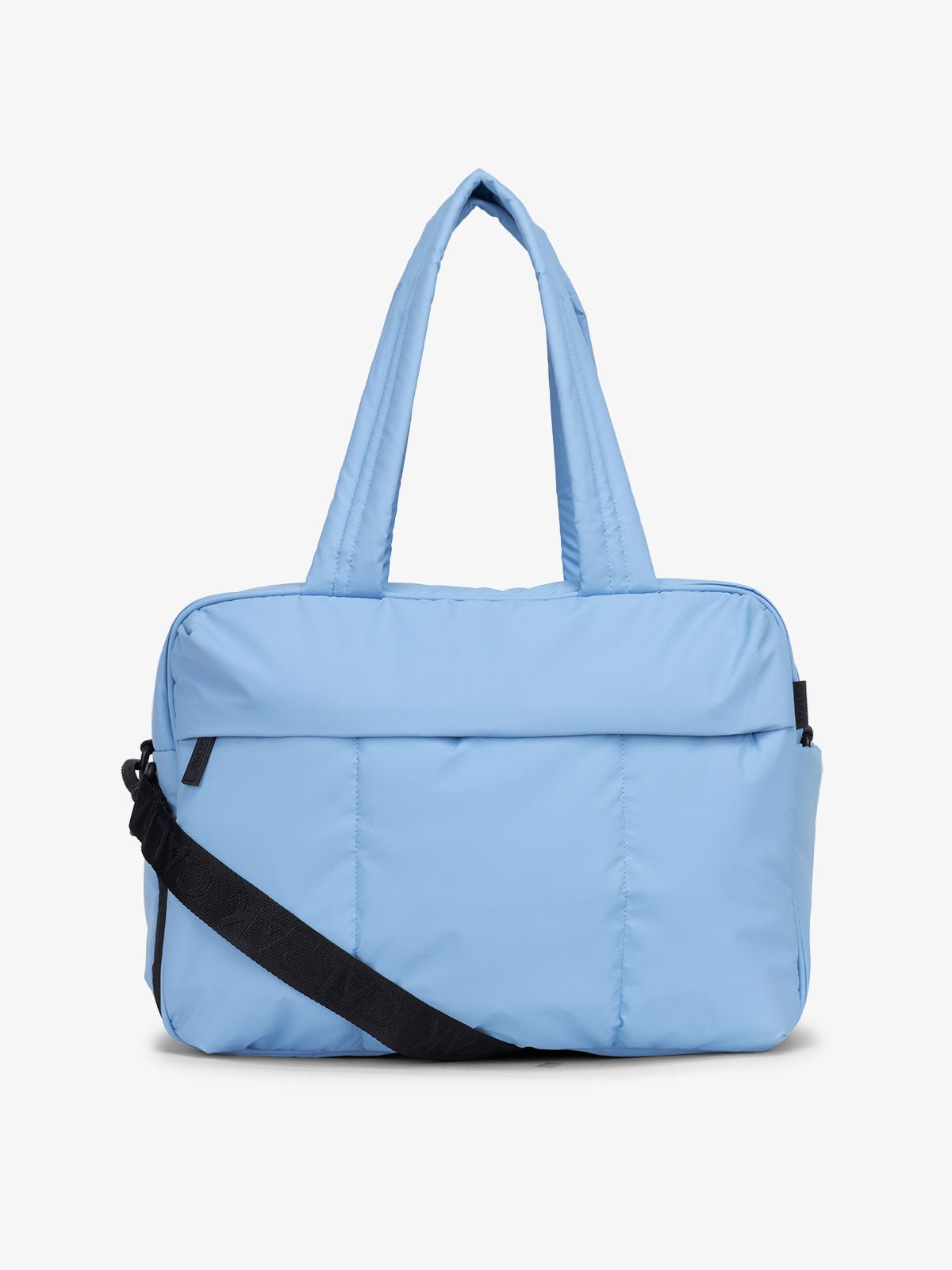 CALPAK Luka Duffel puffy Bag with detachable strap and zippered front pocket in light blue