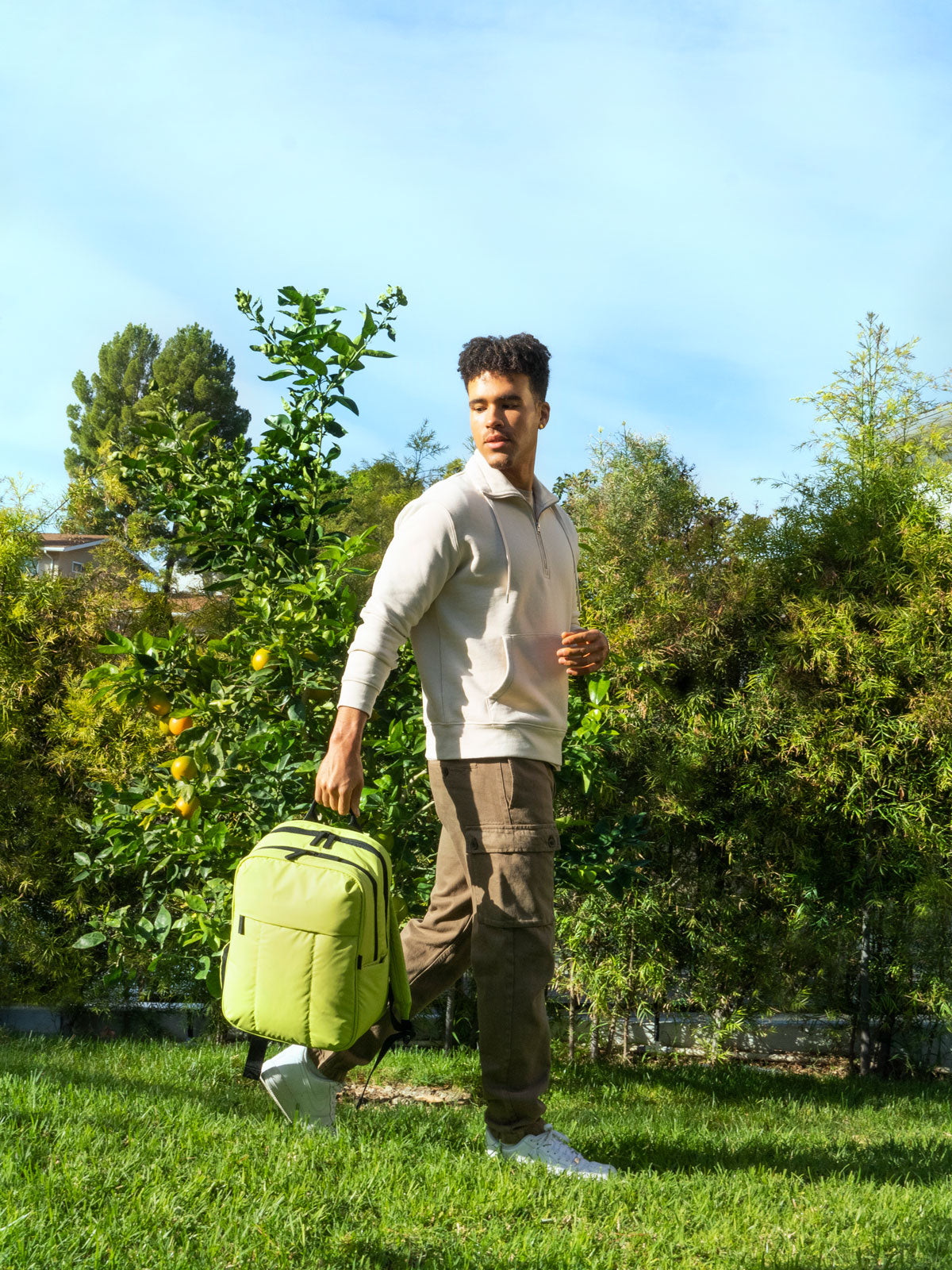 Luka travel backpack for travel in celery green