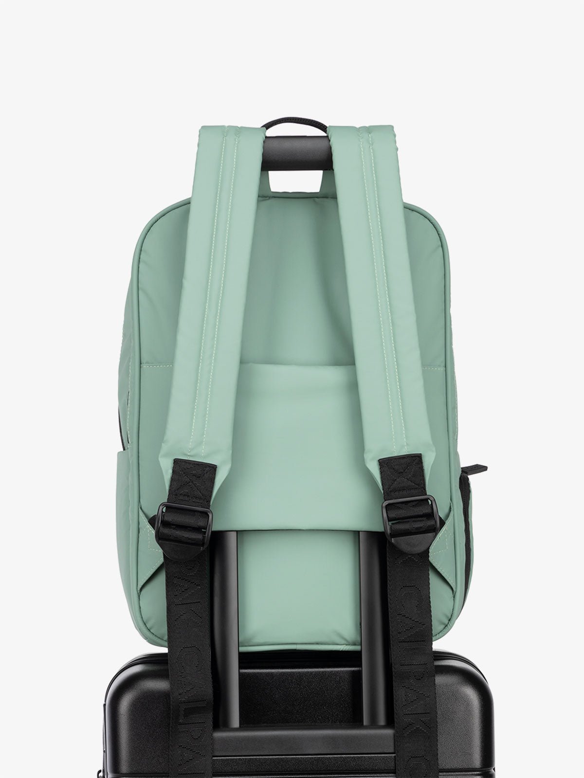 CALPAK water resistant Luka Laptop Backpack with adjustable shoulder straps and trolley sleeve in sage green