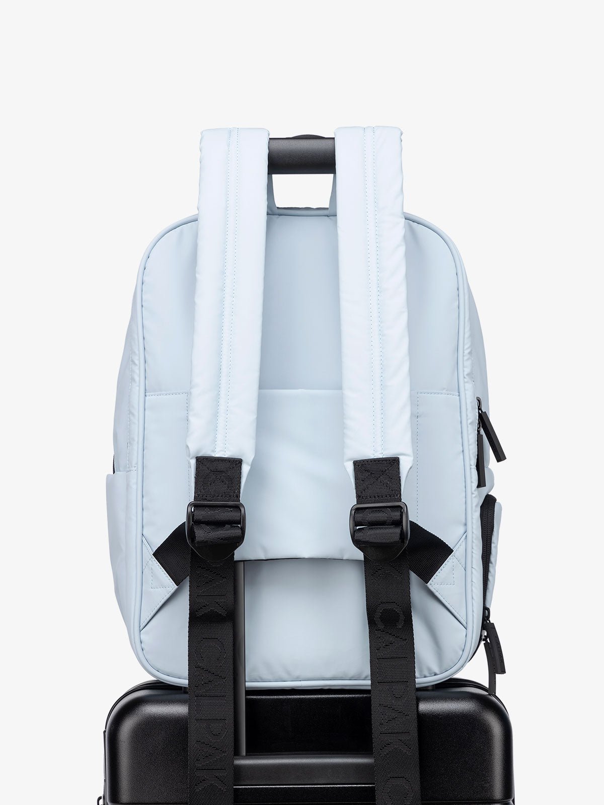 lightweight blue laptop backpack with luggage trolley sleeve