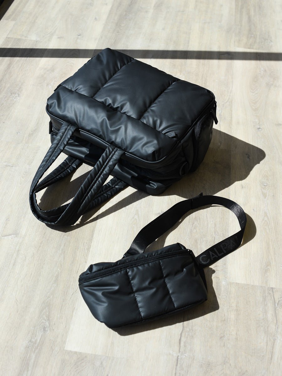 Black belt bag and duffel bag