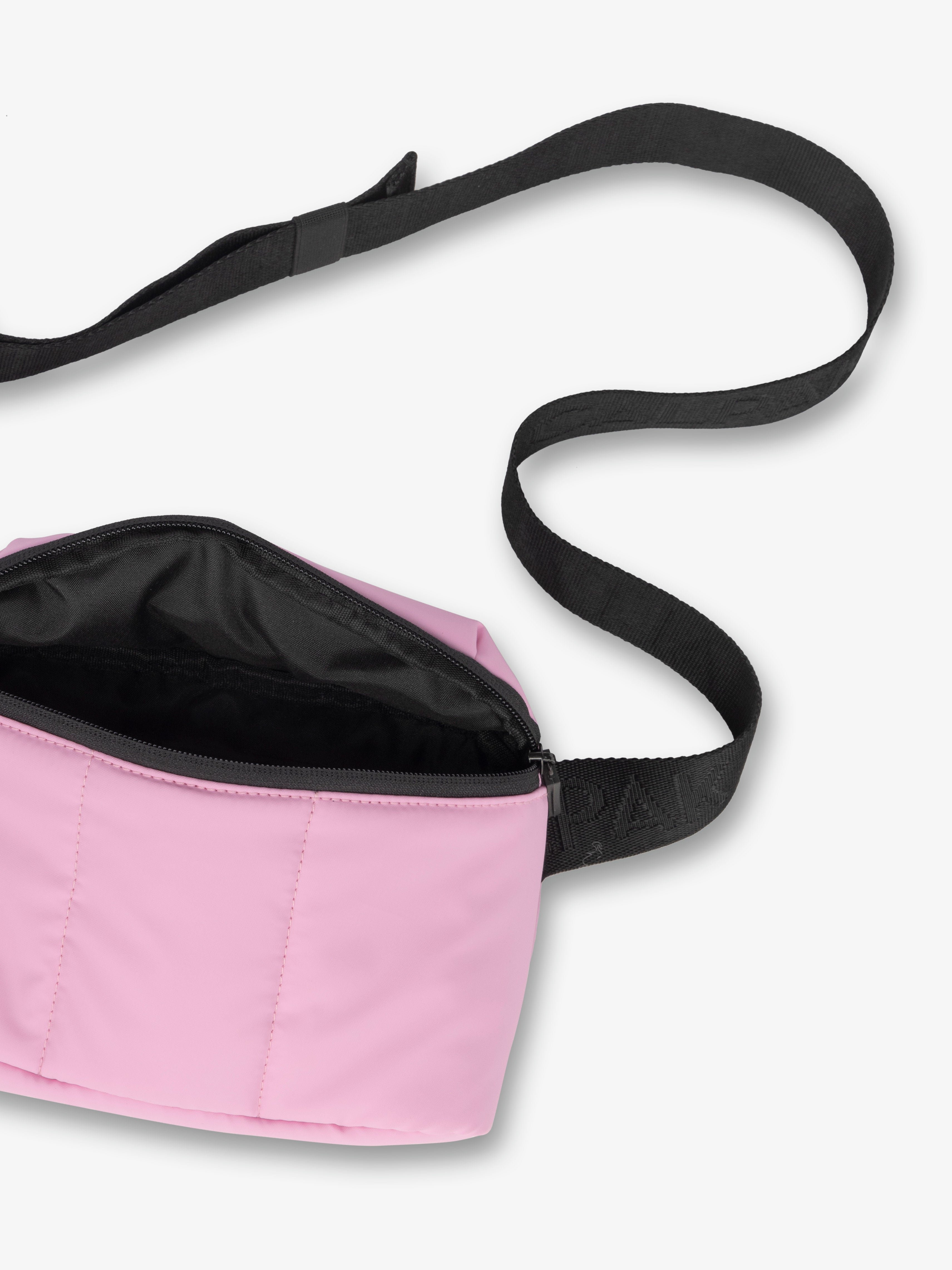 CALPAK Luka mini crossbody fanny pack with soft water-resistant exterior and adjustable strap in pink