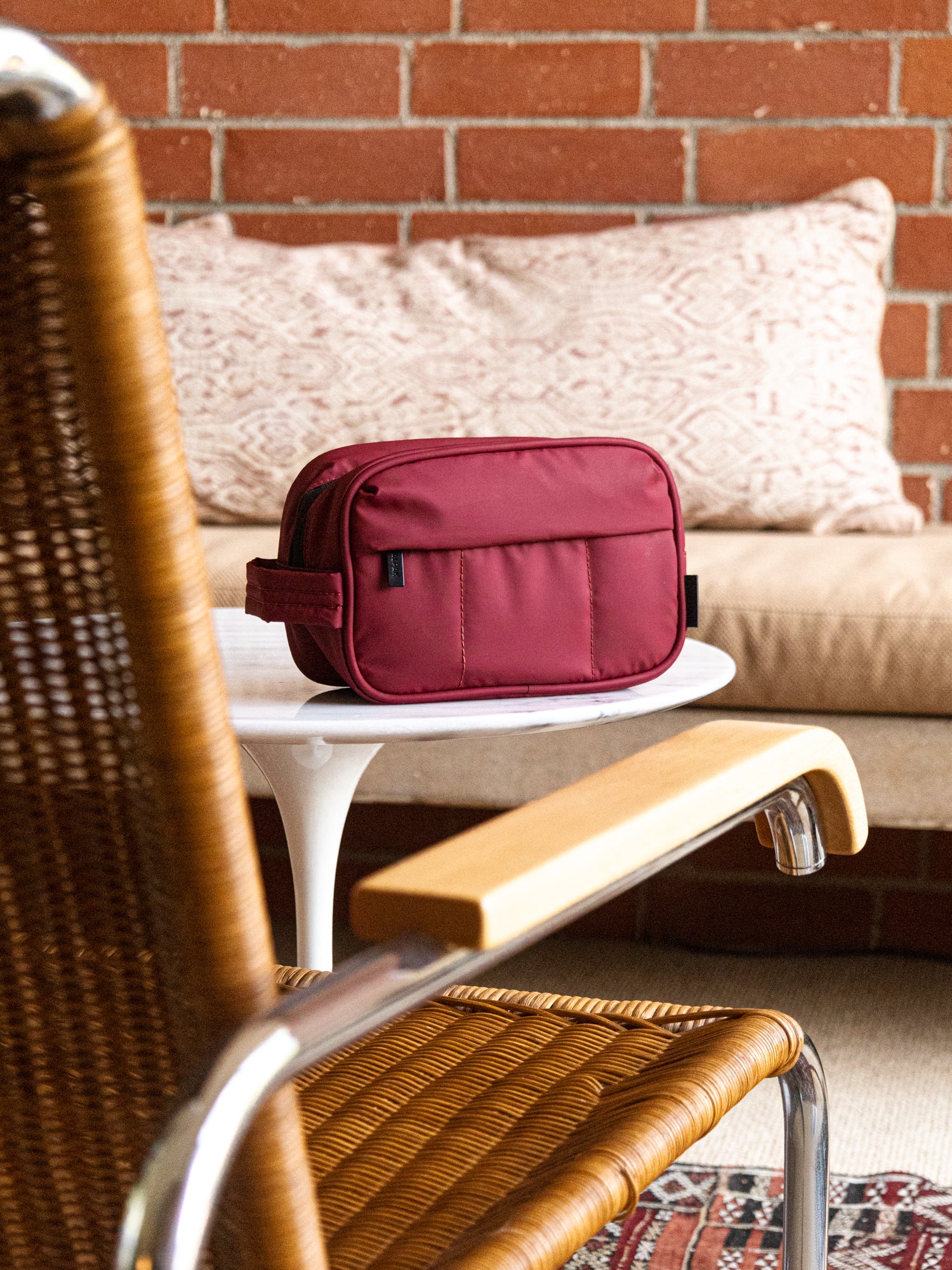 CALPAK Luka Toiletry travel Bag for skincare in merlot