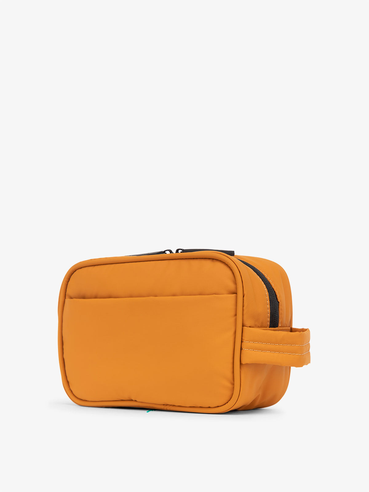 CALPAK Luka Toiletry Bag for travel in pumpkin