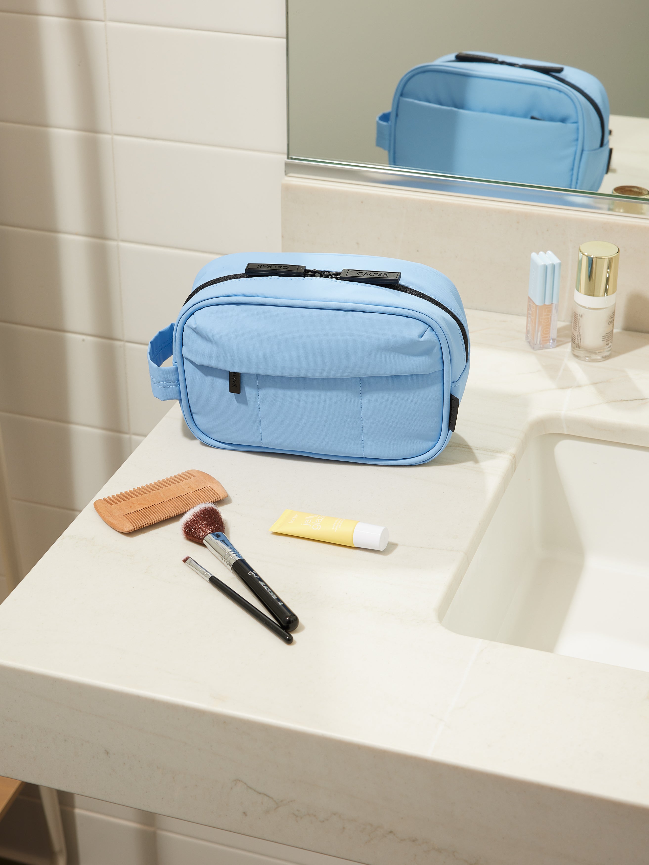 CALPAK Luka Toiletry Bag for women with water resistant lining in winter sky