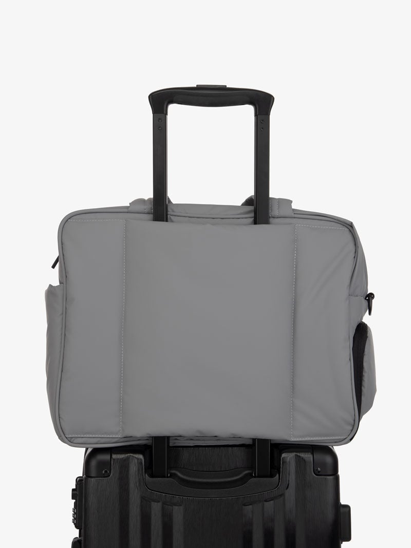 iron grey CALPAK Luka duffel bag with luggage trolley sleeve