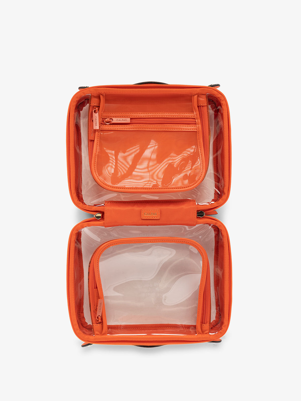 CALPAK clear skincare bag with multiple zippered compartments in orange