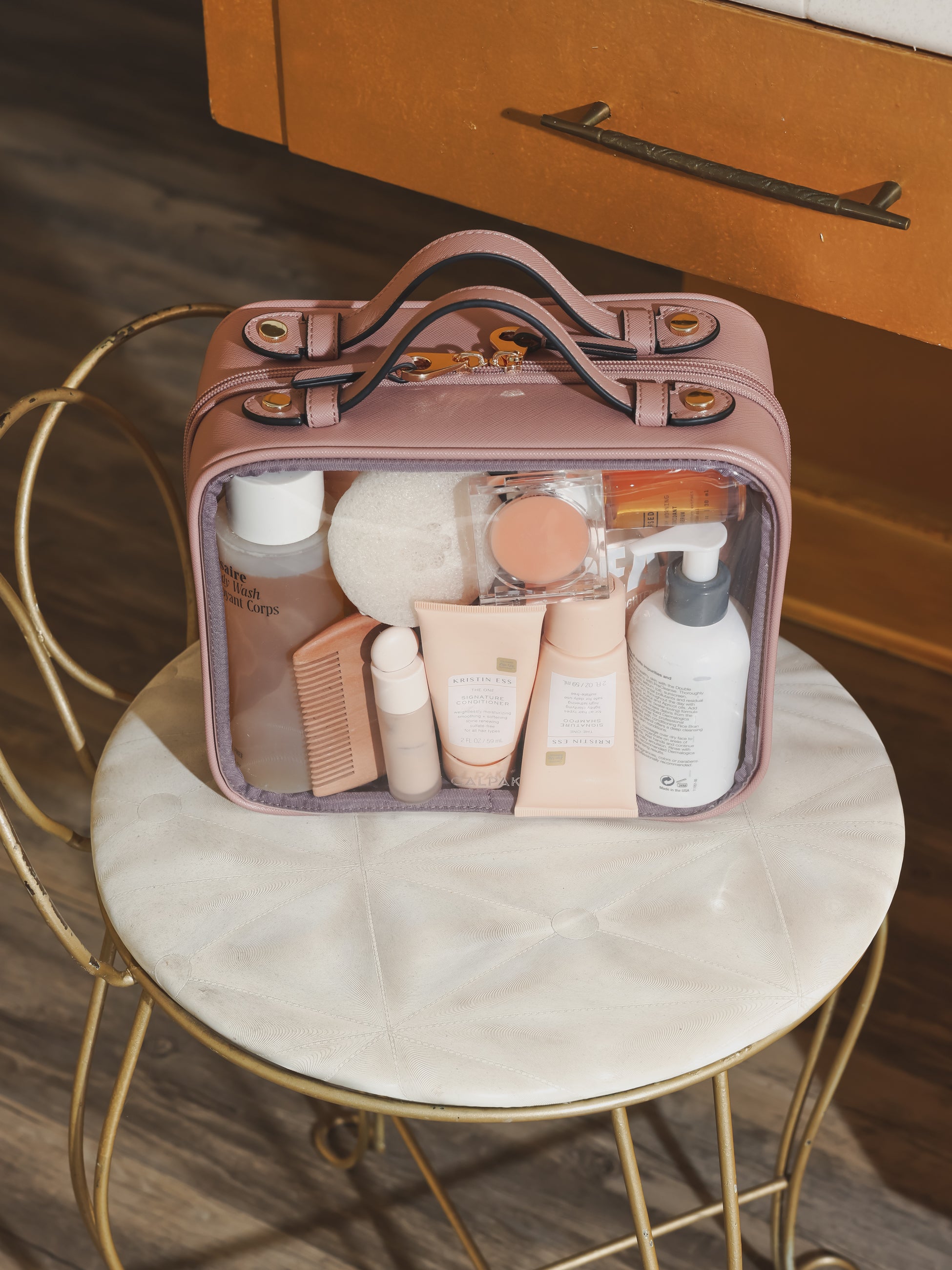 CALPAK medium transparent makeup case with top handles in pink