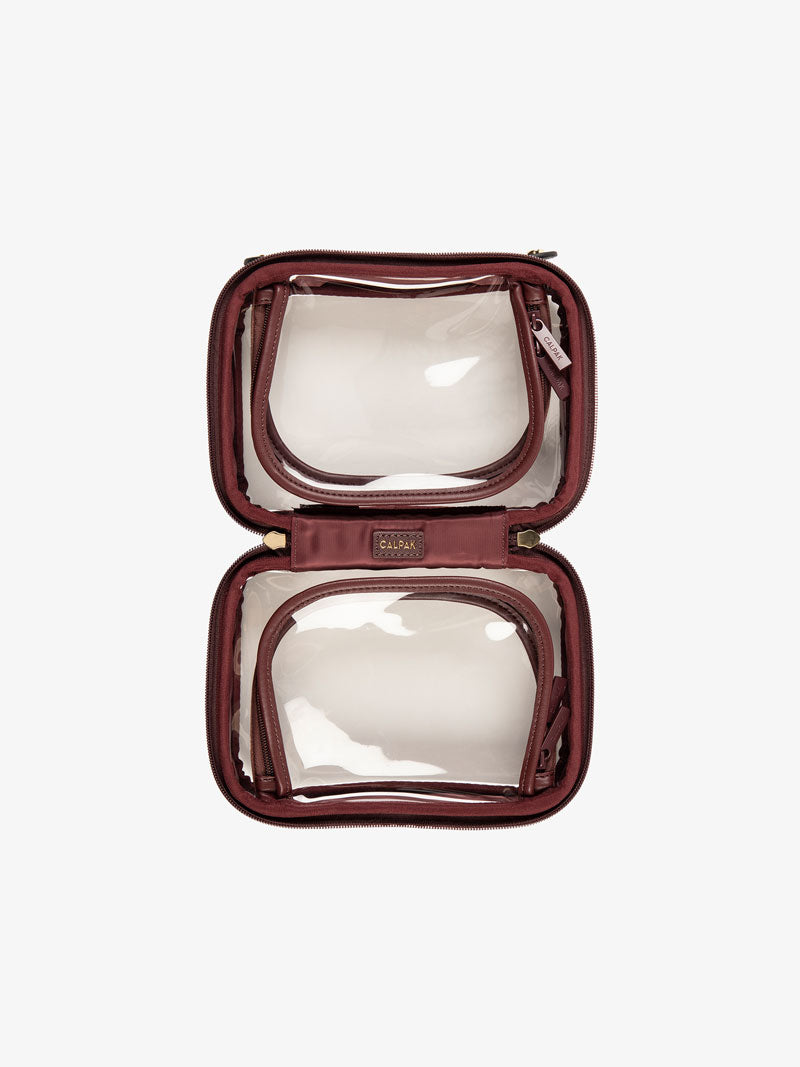 CALPAK small transparent cosmetics case with zippered compartments in burgundy