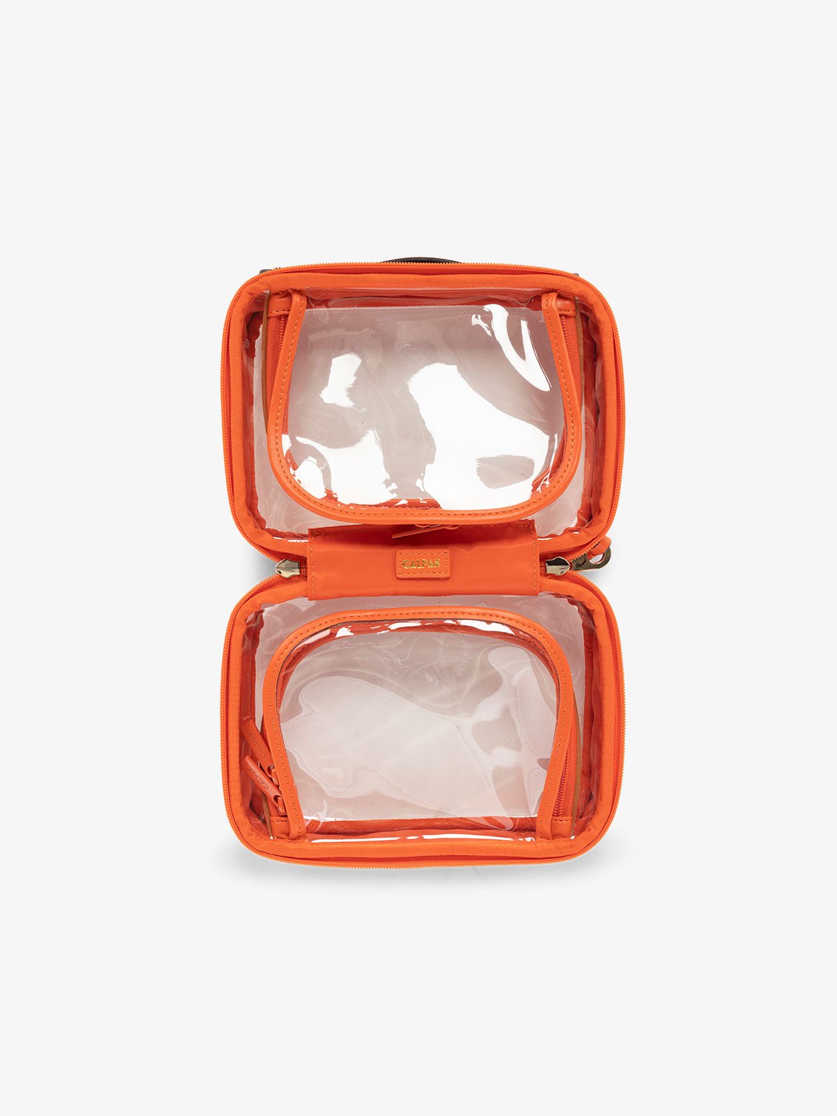 CALPAK small clear skincare bag with multiple zippered compartments in orange