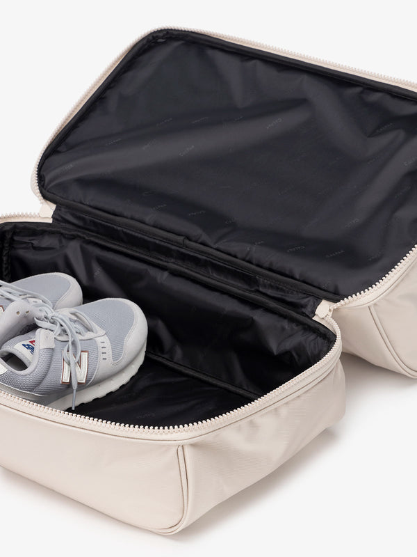 CALPAK Stevyn duffel bag with shoe compartment in cream dune