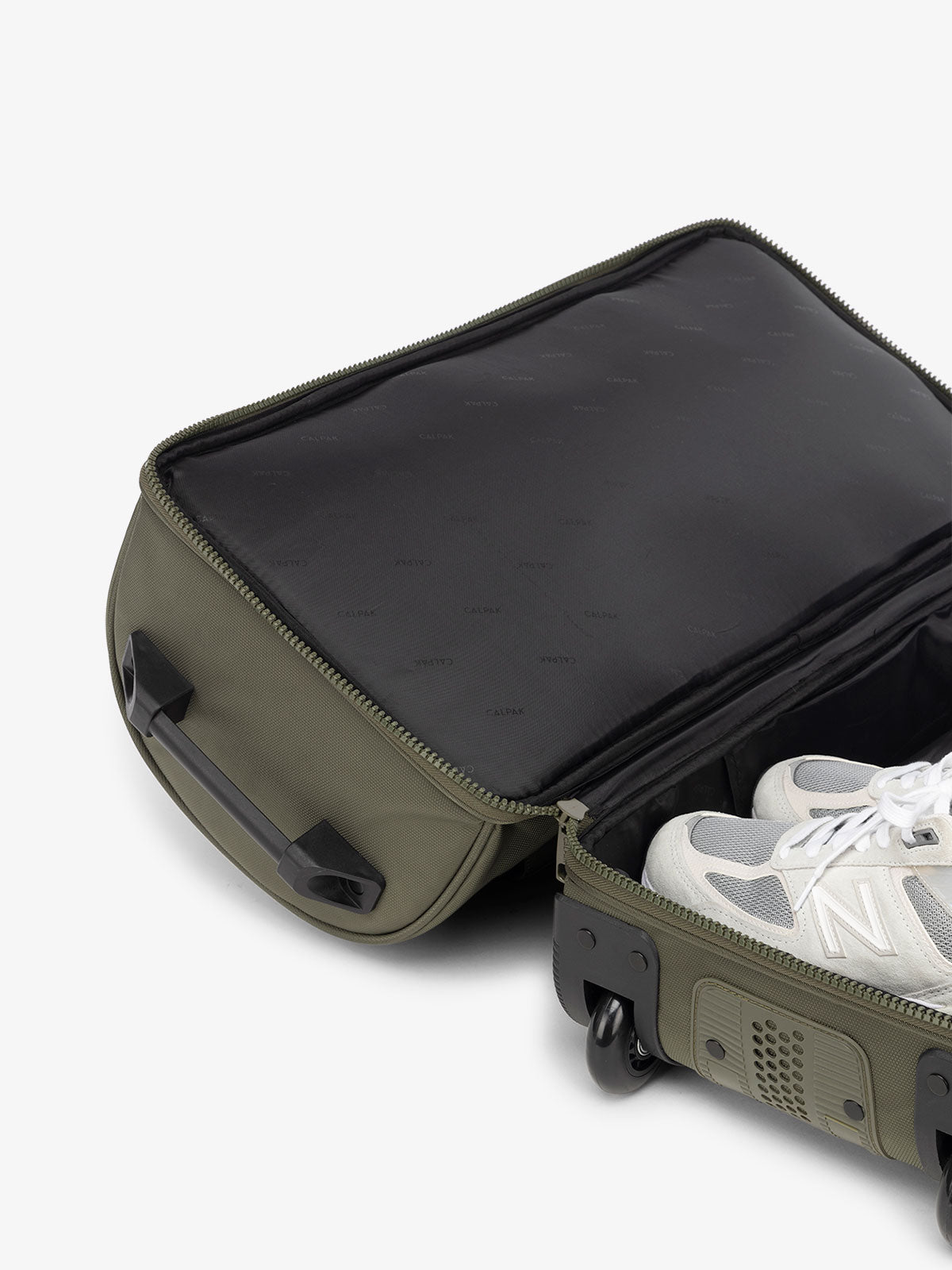 CALPAK Stevyn Rolling Duffle interior of shoe compartments in moss