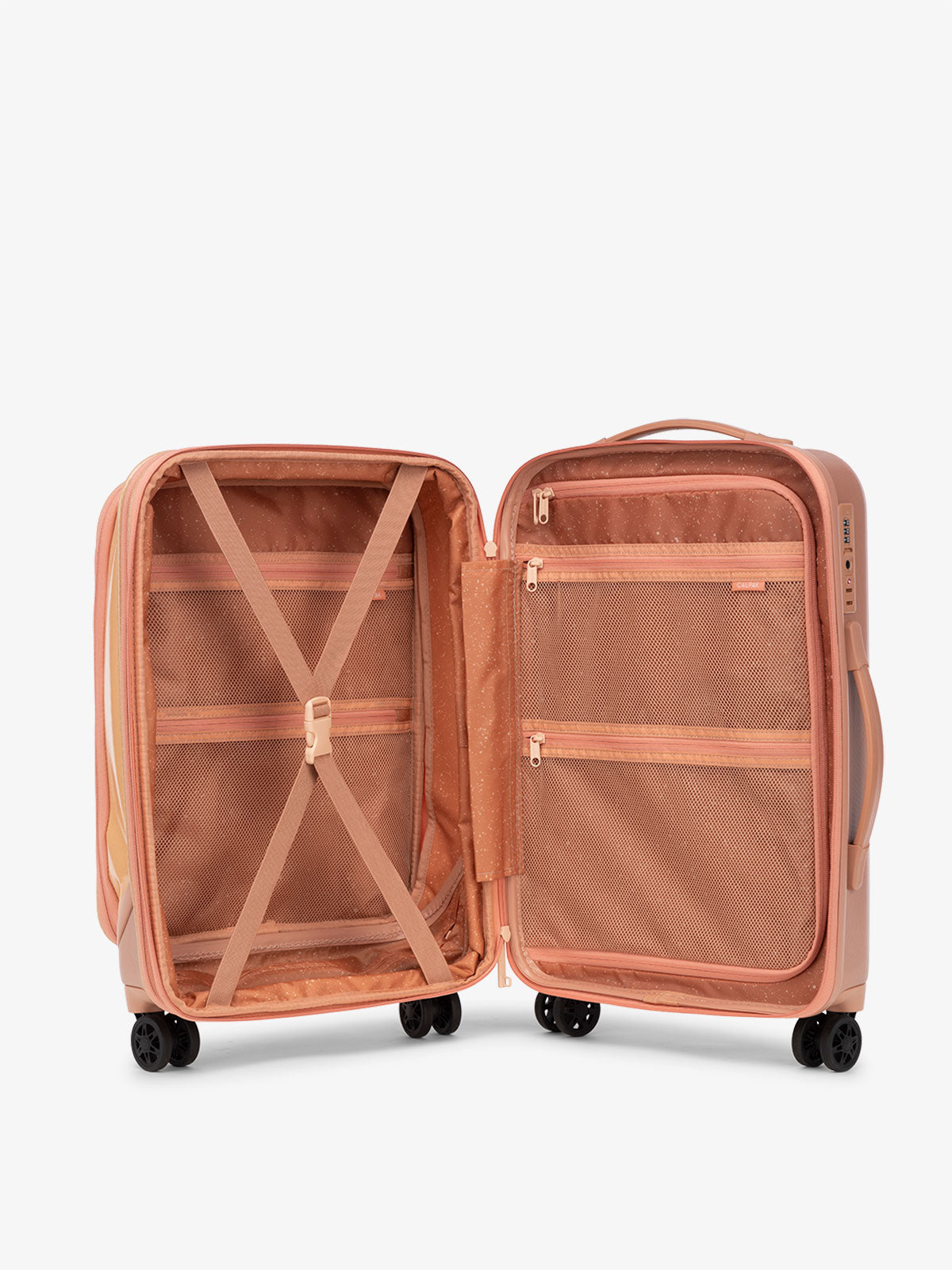 CALPAK Terra Carry-On suitcase interior with multiple pockets and compression strap in canyon
