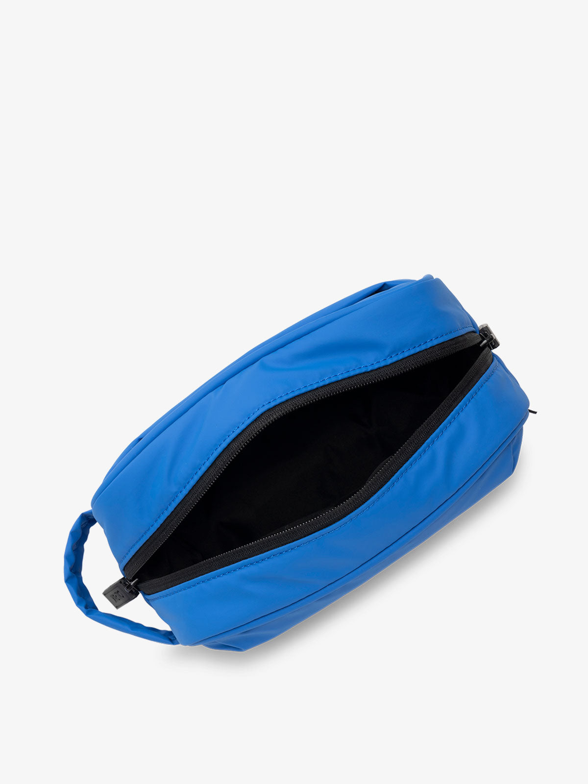 blue quilted toiletry bag in blue