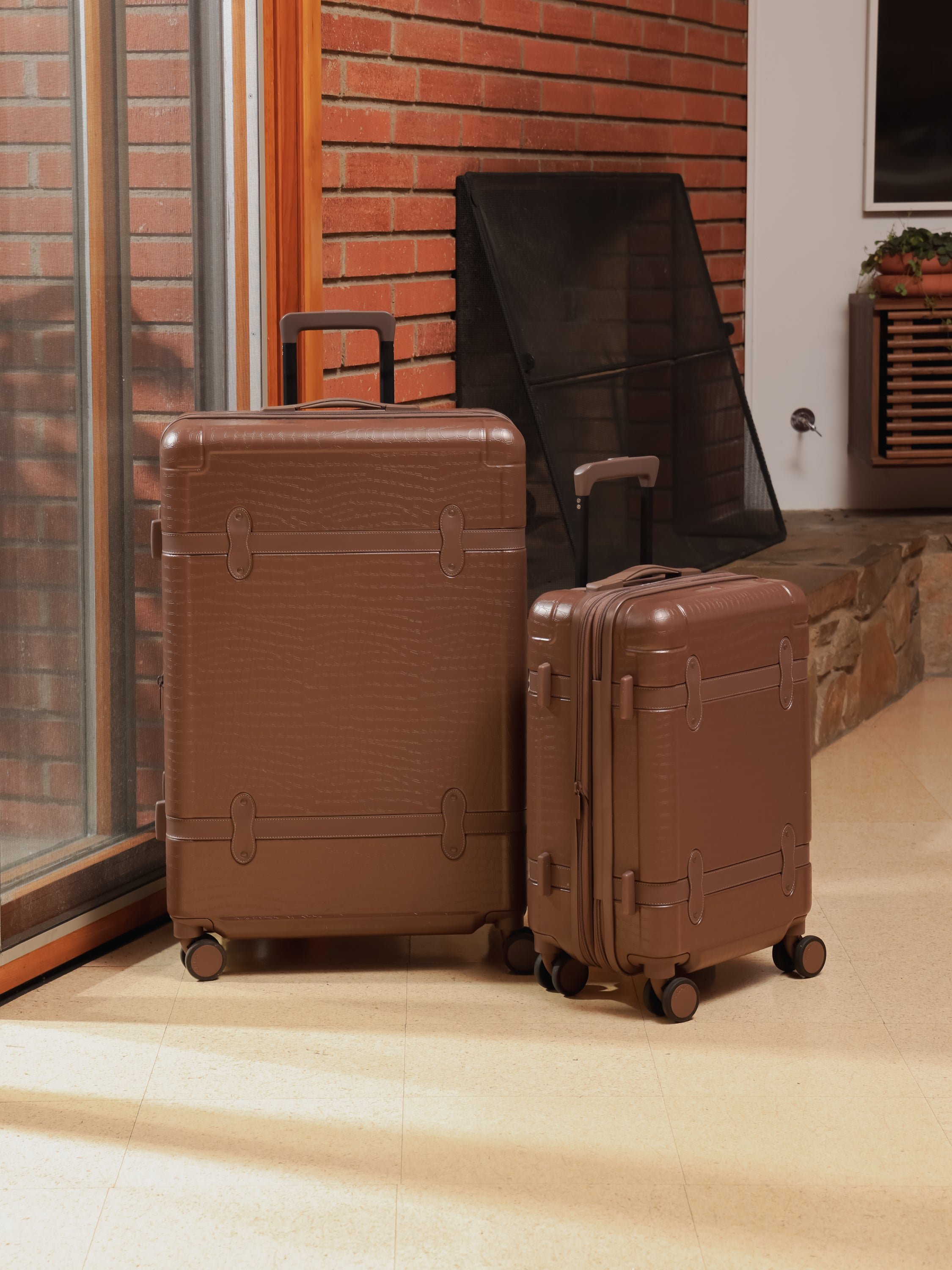 CALPAK TRNK 2 piece luggage set with hard shell exterior and 360 spinner wheels in espresso