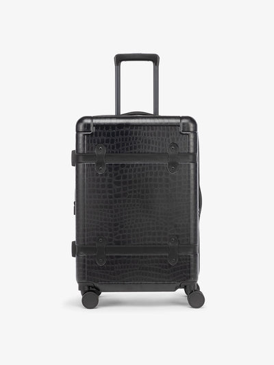 CALPAK TRNK medium 25 inch black luggage in vintage trunk style; LTK1024-BLACK-CROC