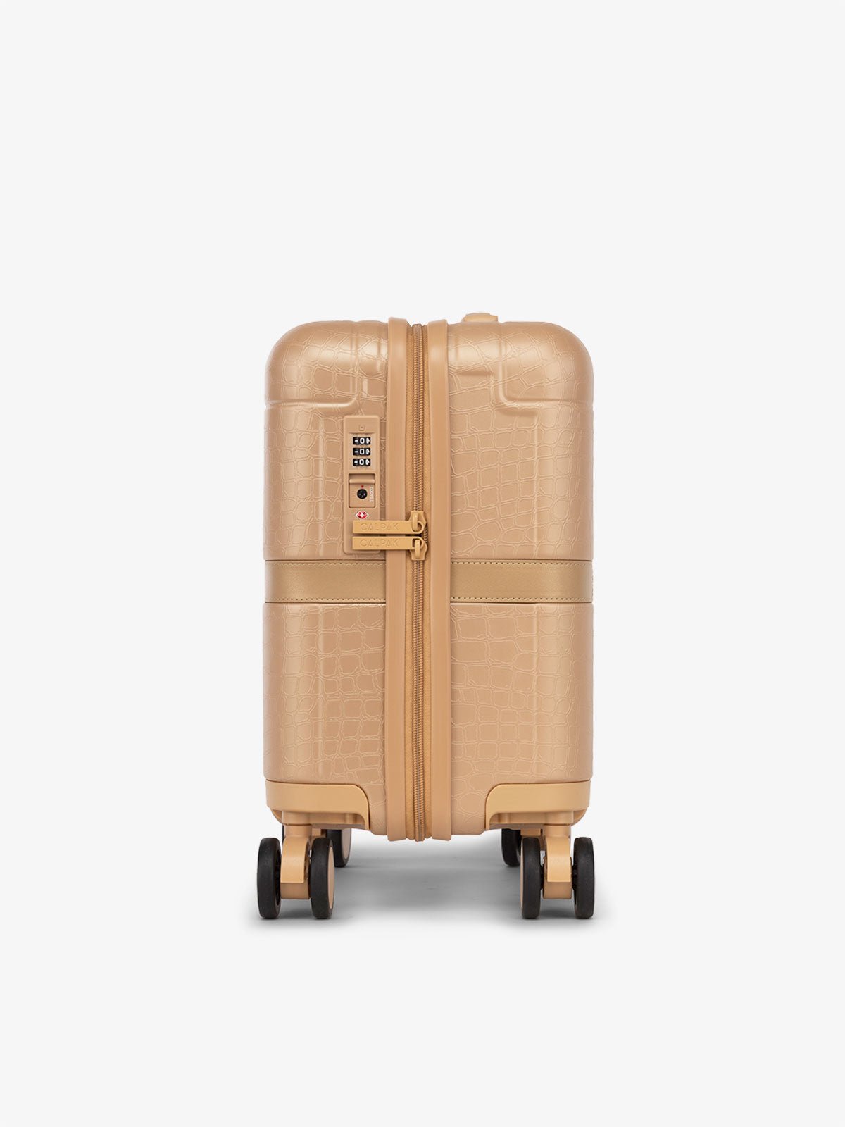 CALPAK TRNK mini luggage with TSA approved lock and 360 spinner wheels in beige